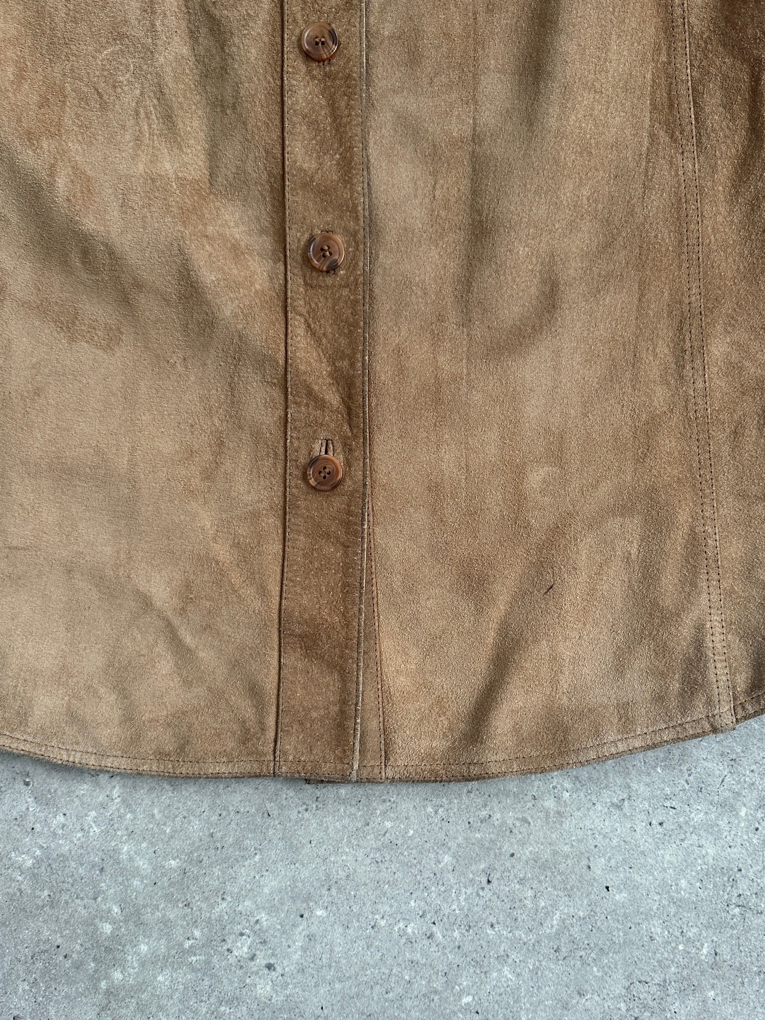 Vintage suede shirt in size large, featuring a classic design with a soft suede texture and button-front closure.