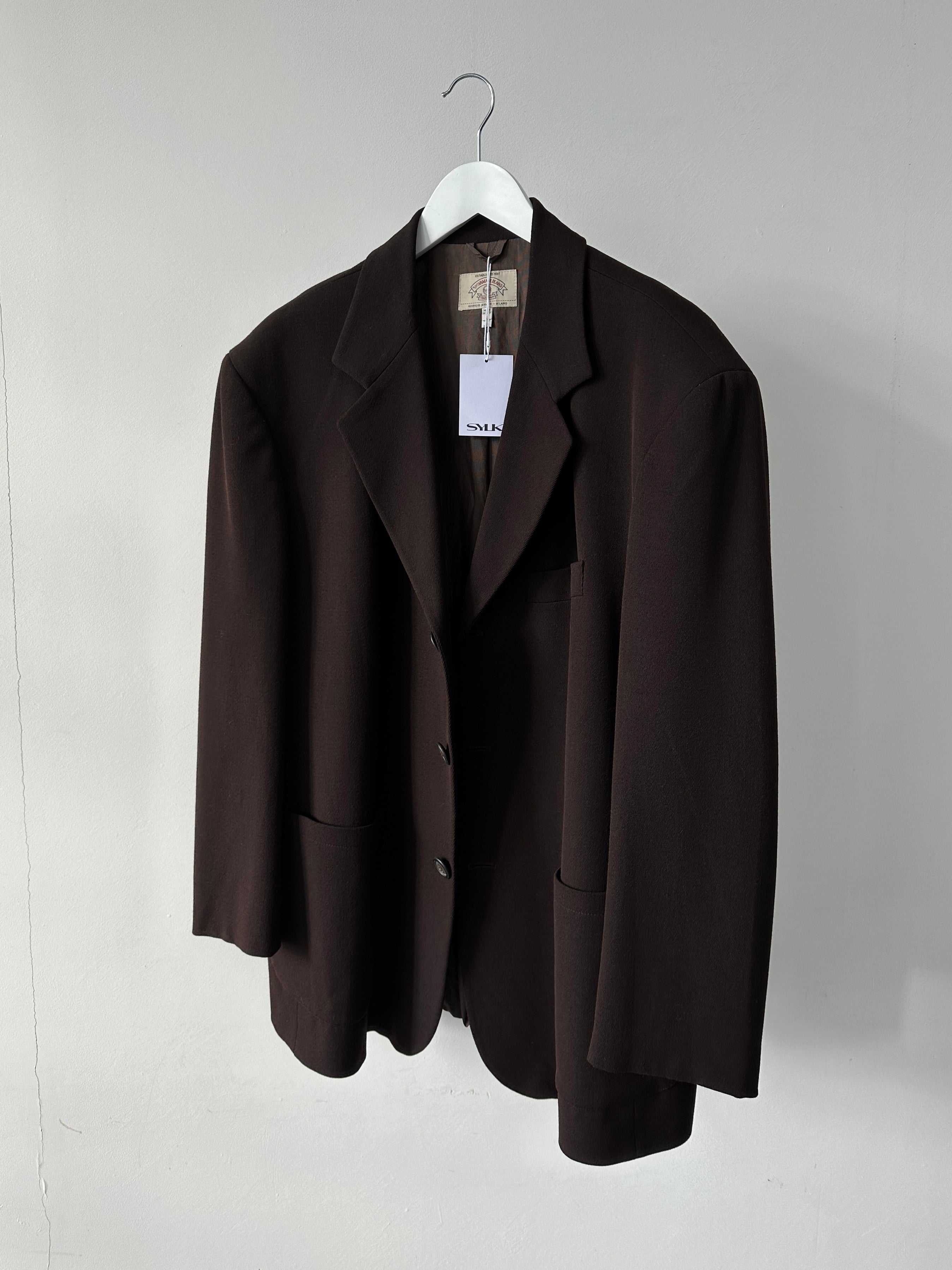 Armani oversized single-breasted blazer in size 46/XL, tailored fit, featuring classic lapels and structured design.