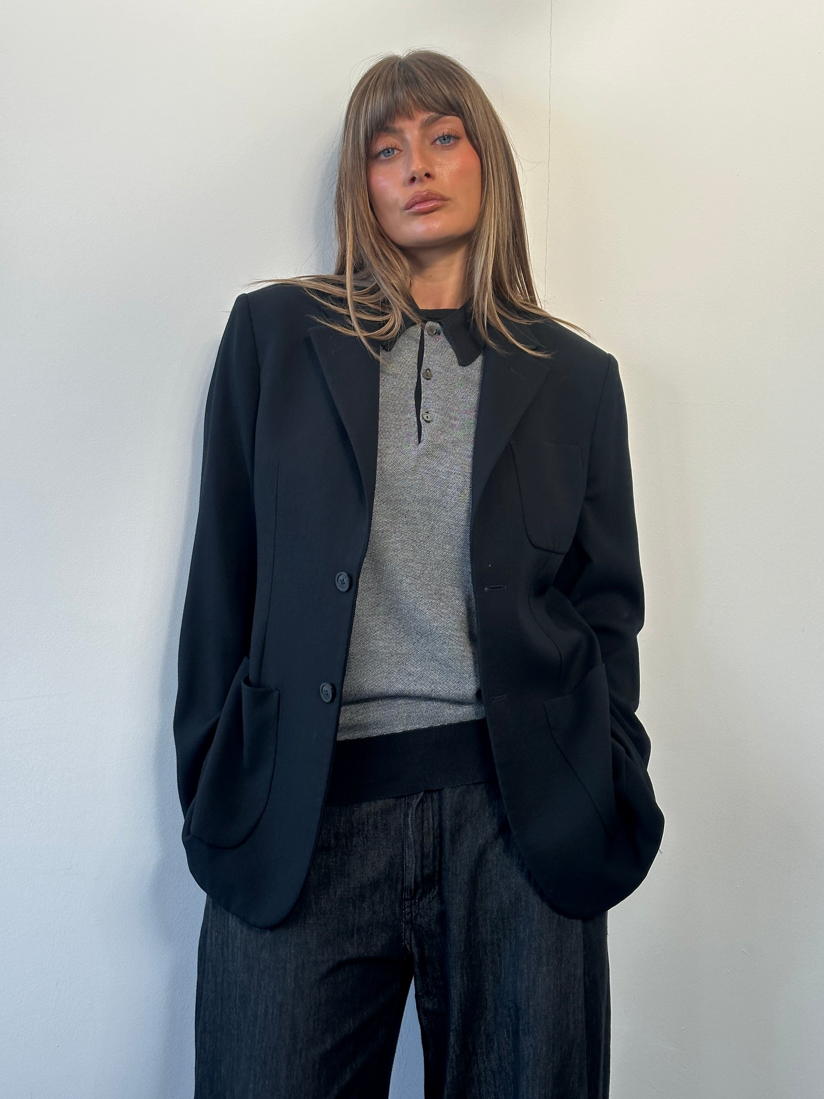 Emporio Armani men's 2000s pure wool single-breasted blazer in classic style, shown in a tailored fit with lapel collar.
