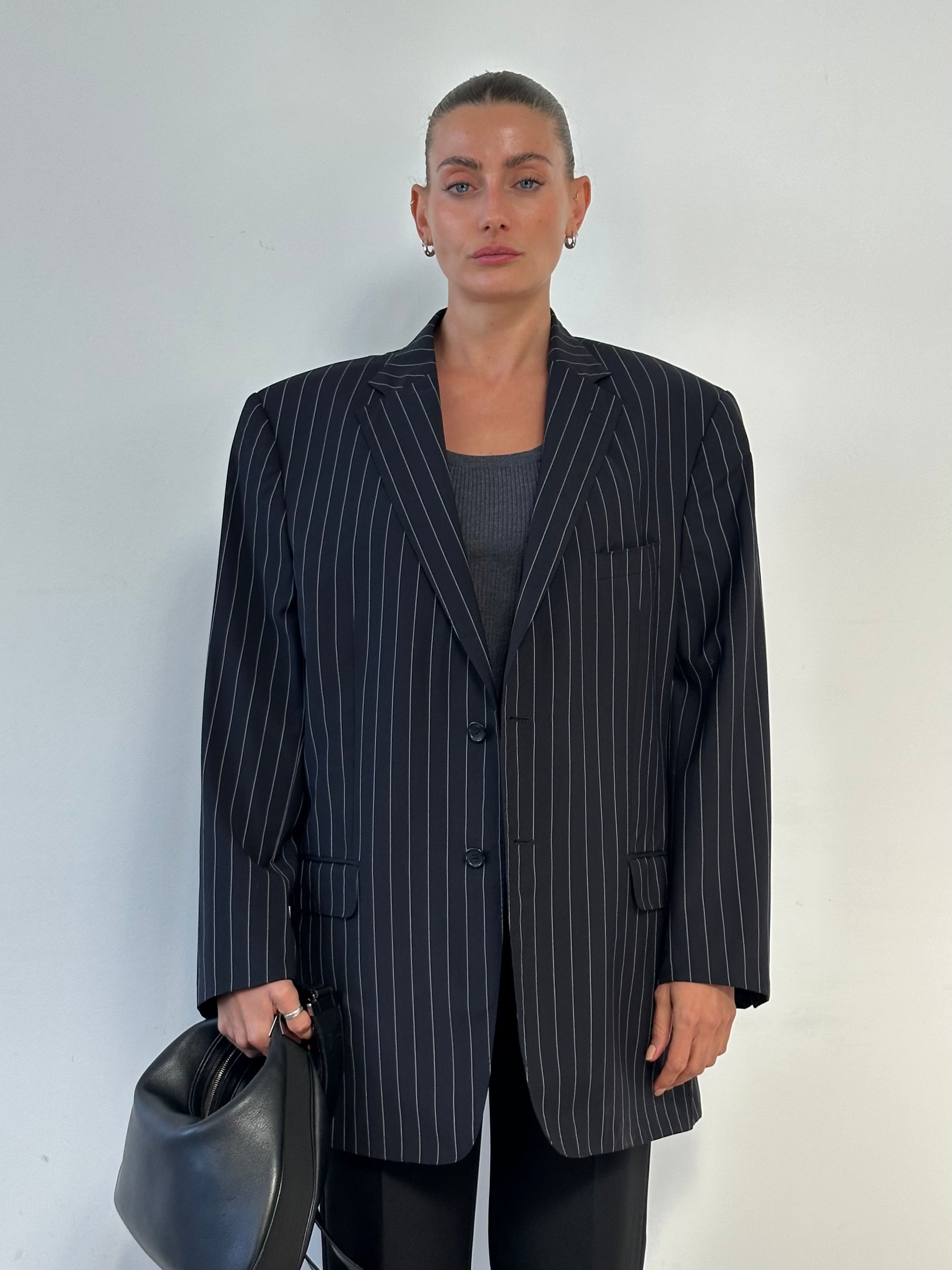 Versace collection stripe pure wool single-breasted blazer in size 48R/XL, featuring a stylish tailored fit with bold stripe pattern.