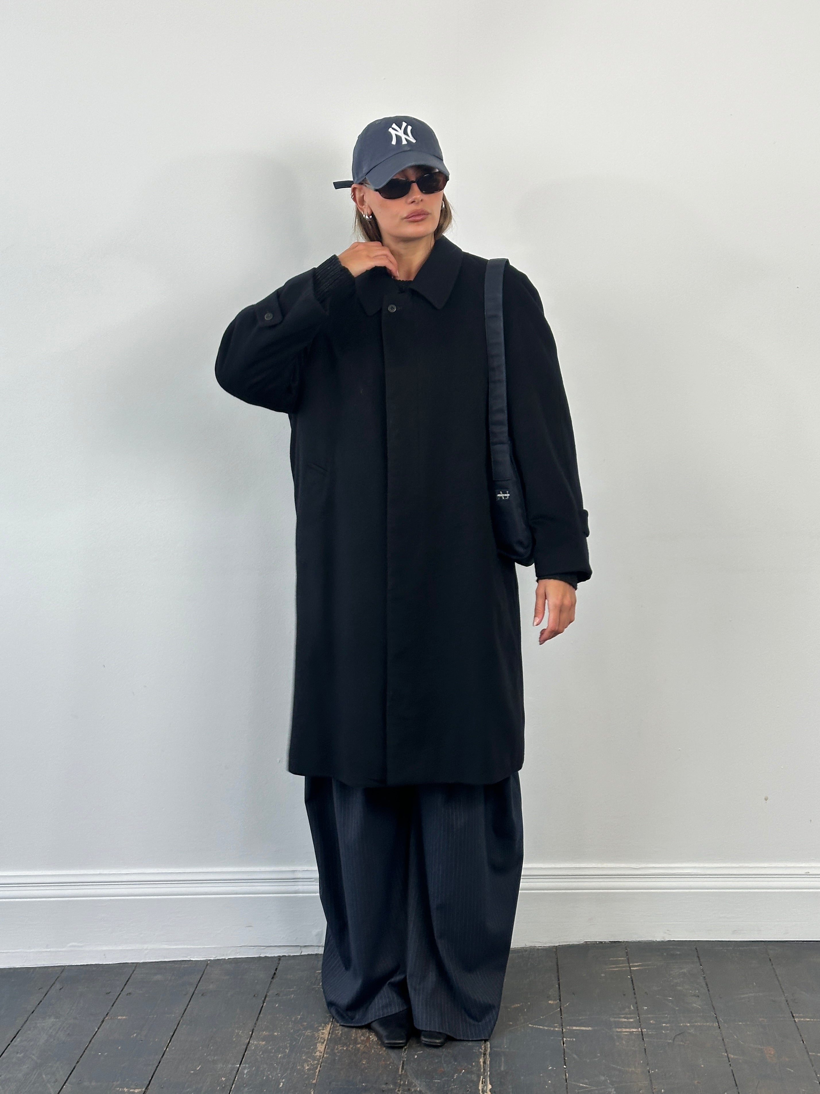 Givenchy 1990s pure wool coat with concealed placket in XL, showcasing classic tailored style and high-quality fabric.