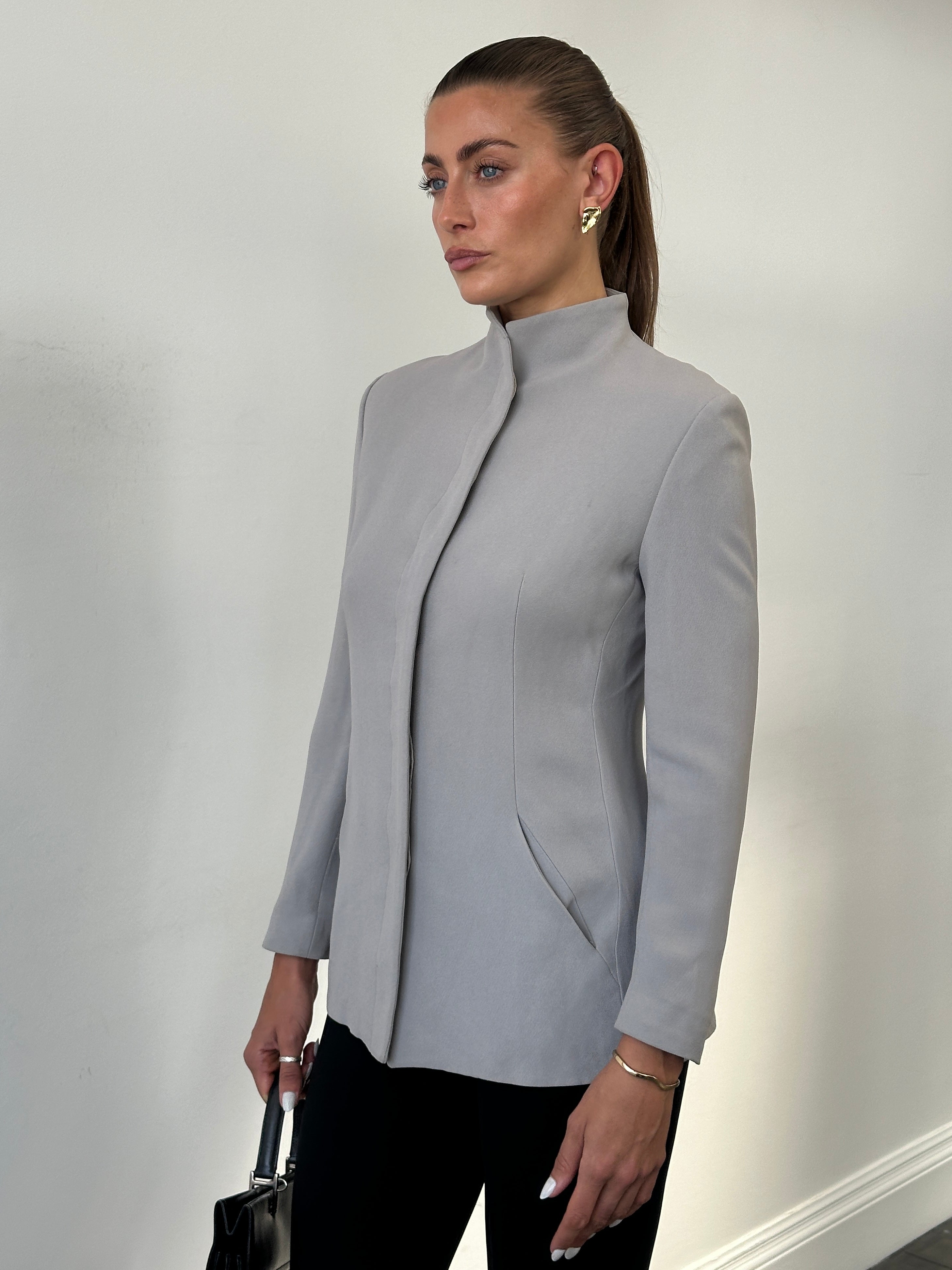 Emporio Armani high neck fitted blazer jacket in black, tailored design with minimal style, size S/M, front view.