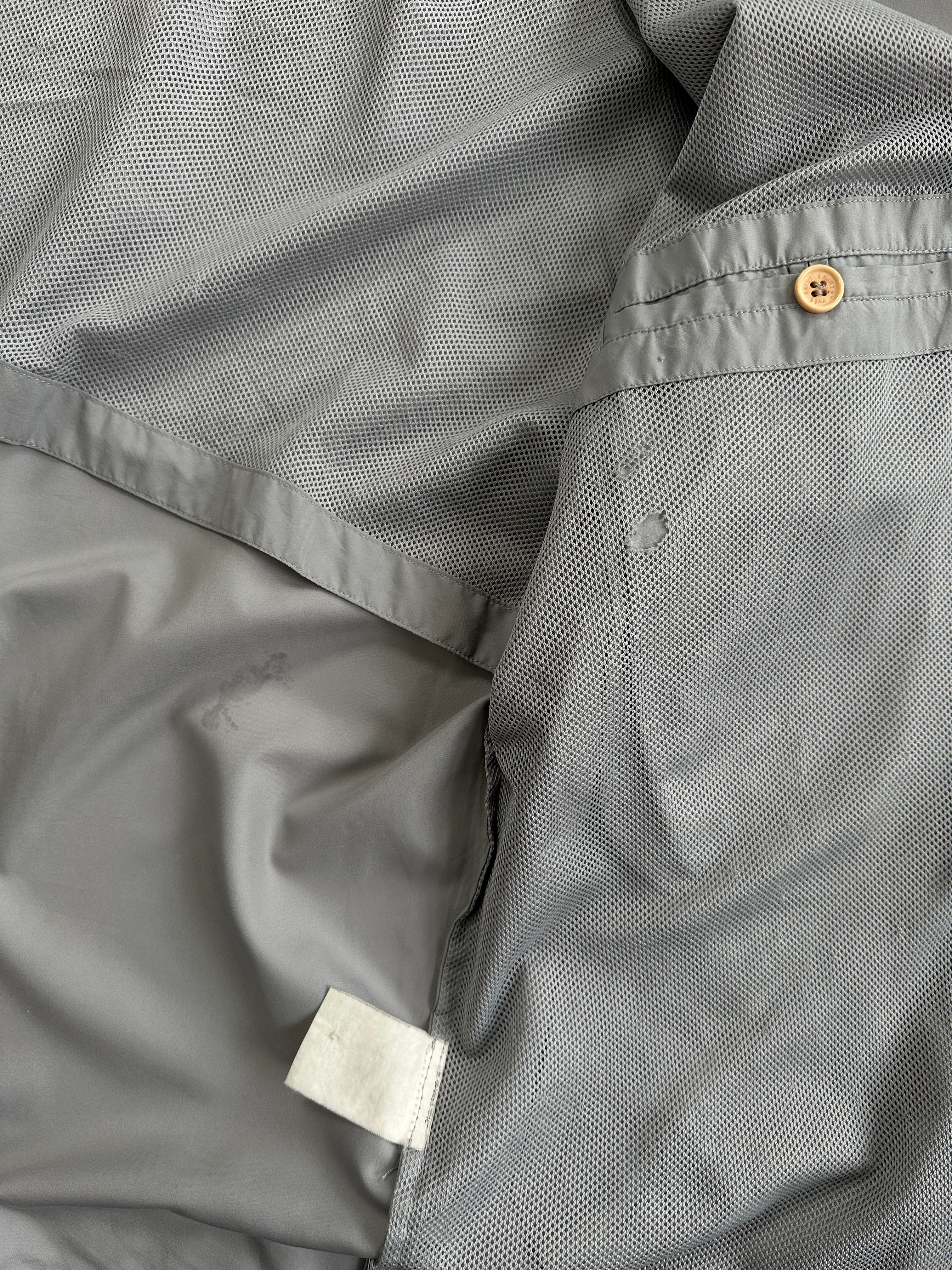 Yves Saint Laurent logo bomber jacket in size M, black with iconic YSL branding, displayed on a hanger.