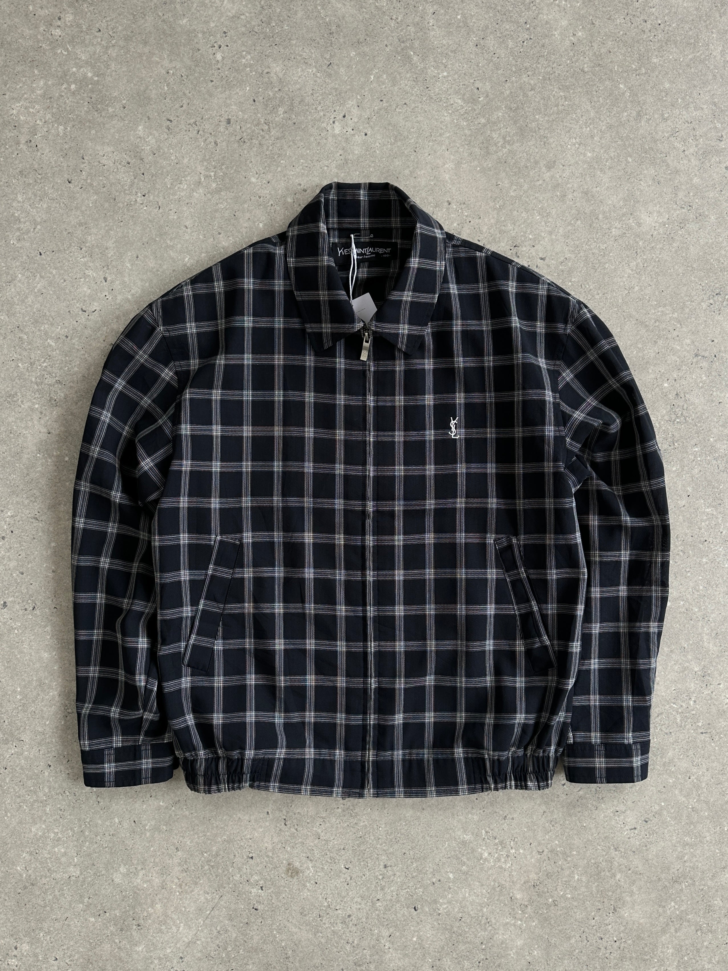 Yves Saint Laurent Pour Homme check logo bomber jacket in black and white, featuring a classic bomber style with logo details.
