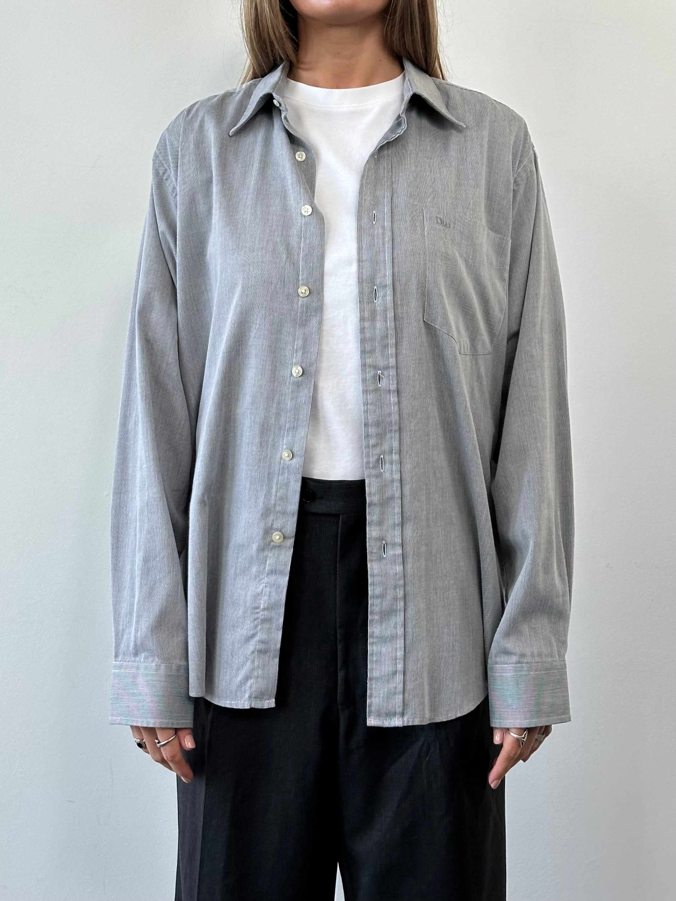 Christian Dior cotton logo shirt in size L/XL, featuring a classic design and Dior branding on the front.