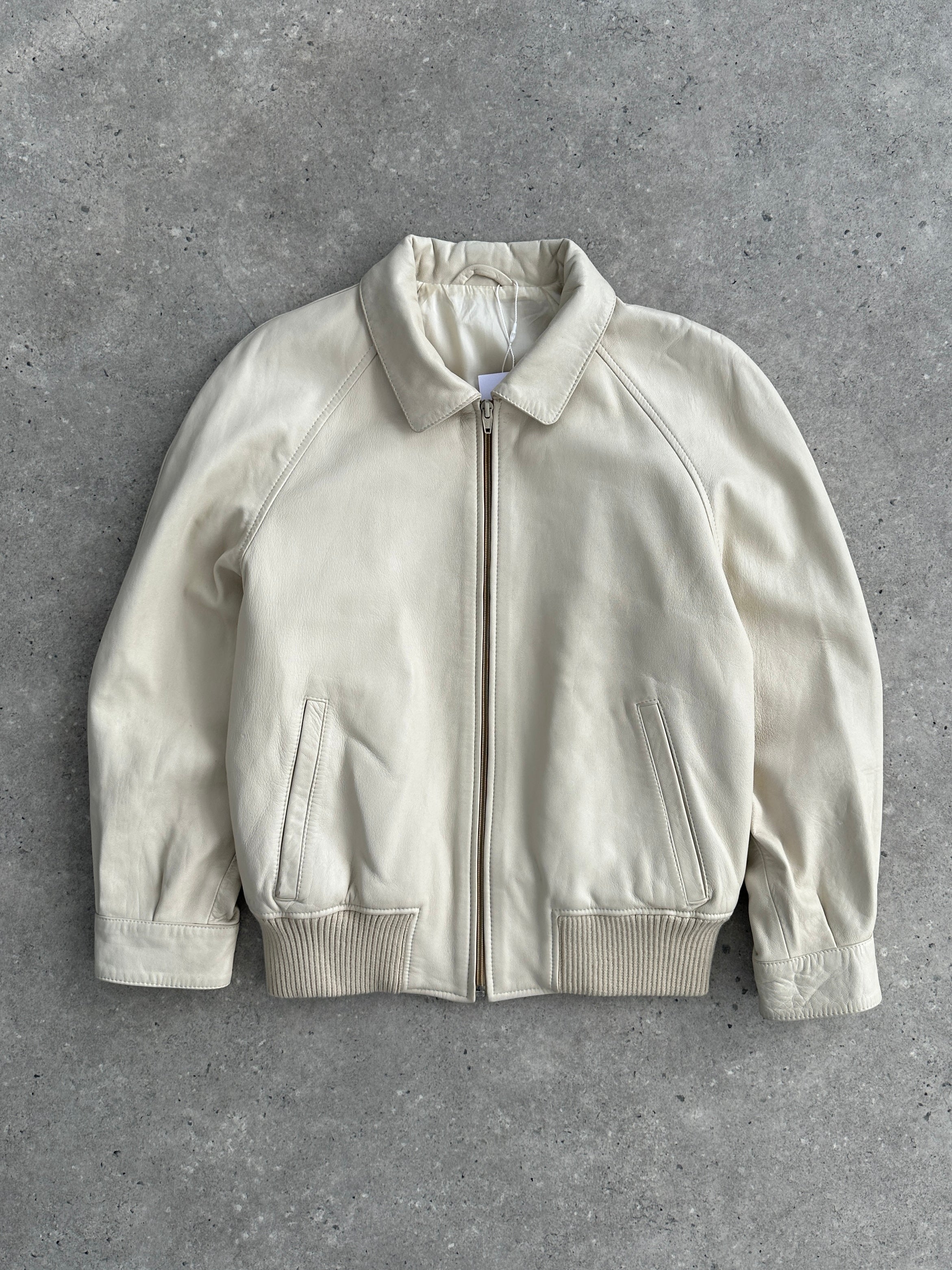 Vintage brand vintage leather bomber jacket in size small, featuring classic design and textured leather material.