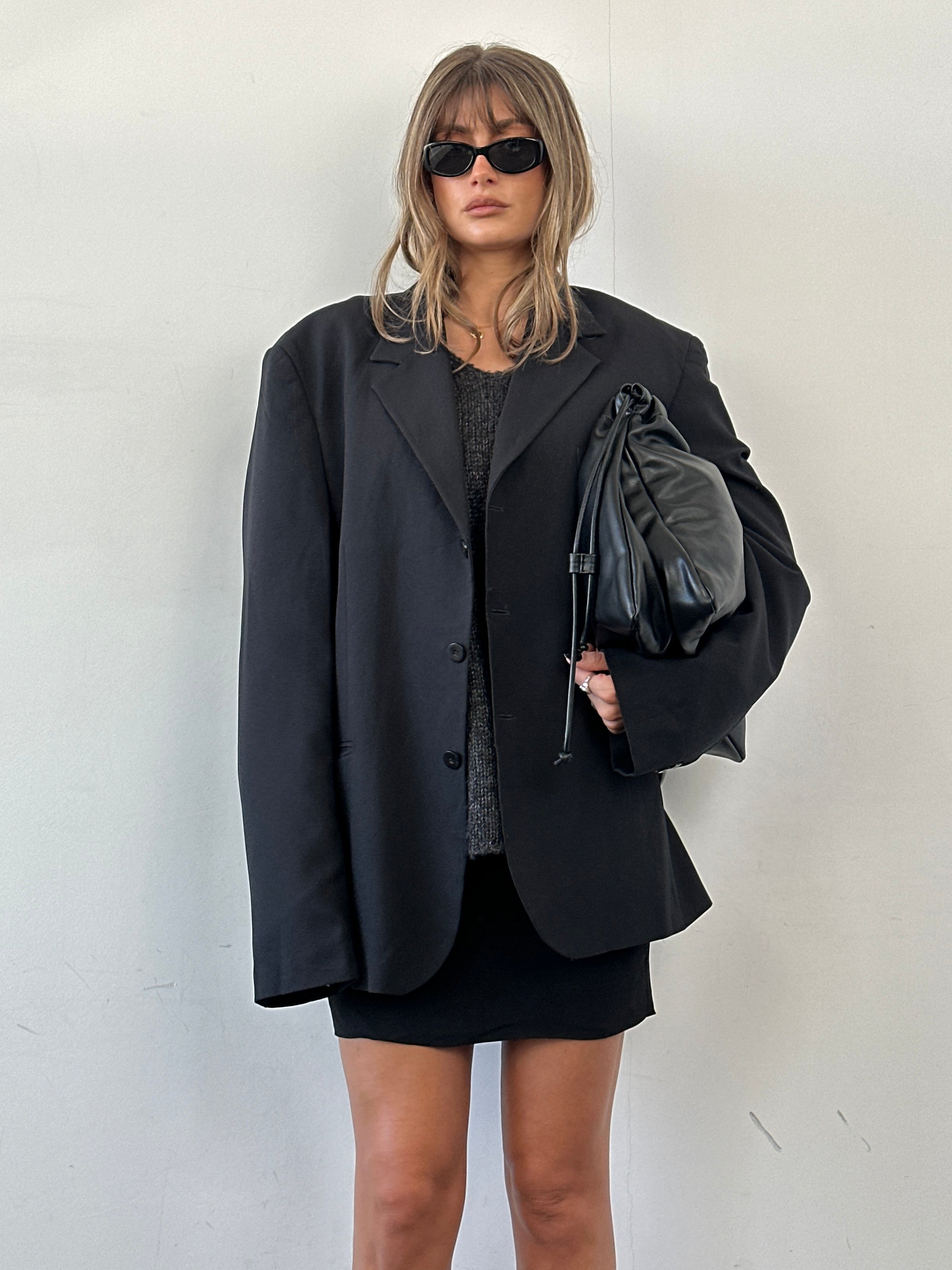Vintage oversized single-breasted blazer in XL, stylish and classic, featuring a structured fit and vintage-inspired design.