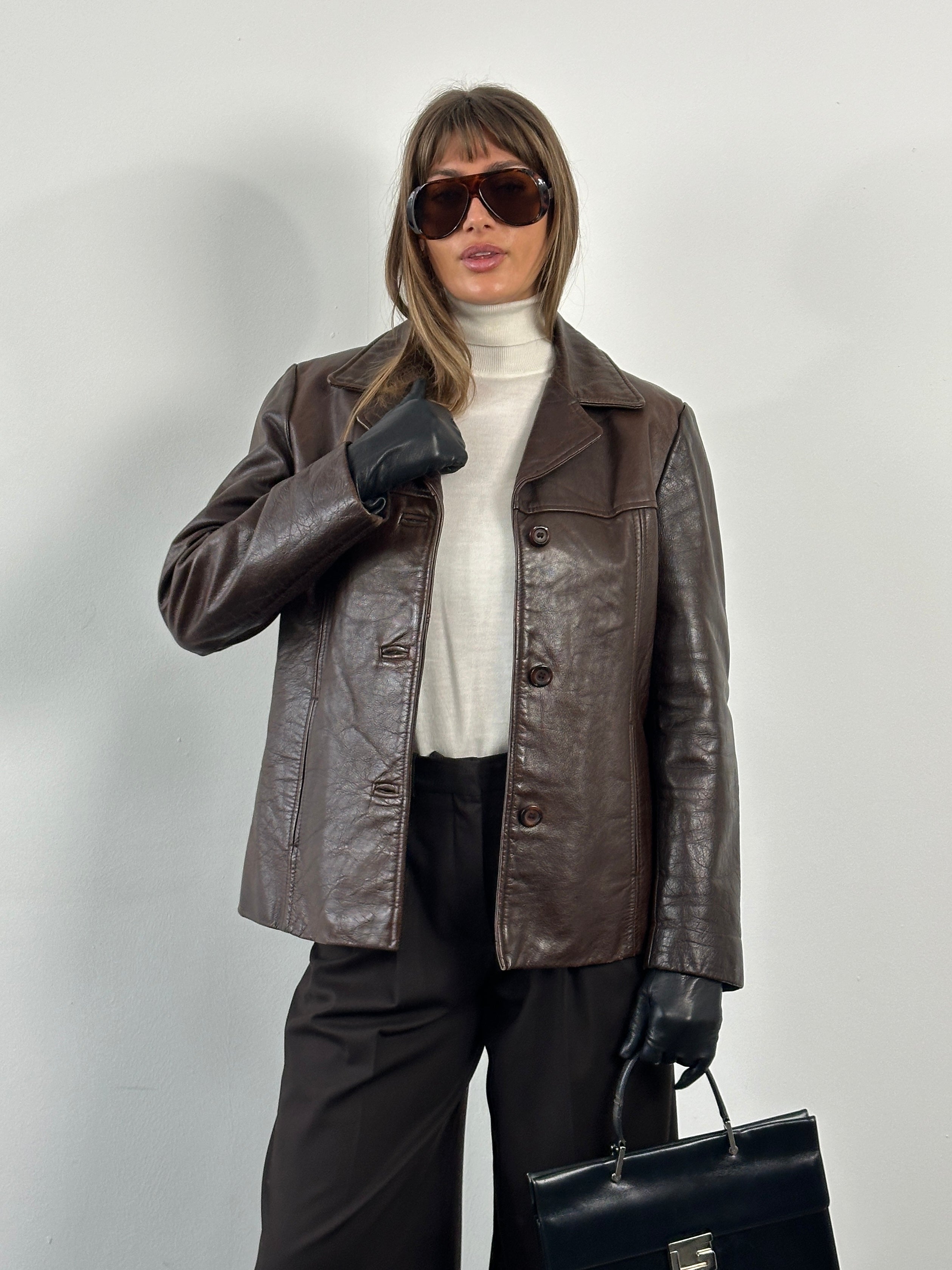 Vintage 1990s high button leather jacket in size M, classic brown leather with detailed stitching and stylish collar design.