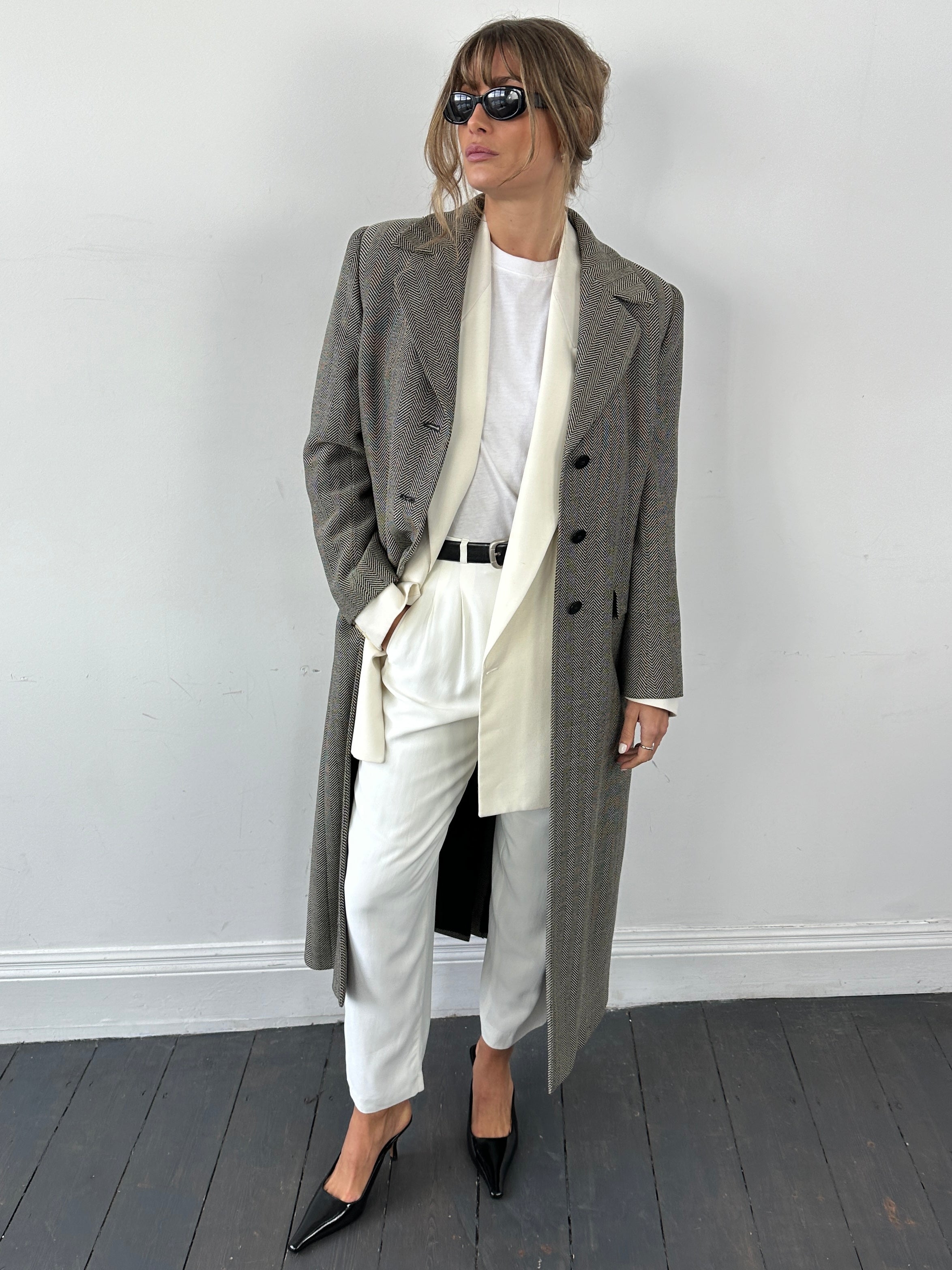 Giorgio Armani Le Collezioni virgin wool herringbone coat in size M, featuring a classic tailored design with a herringbone pattern.