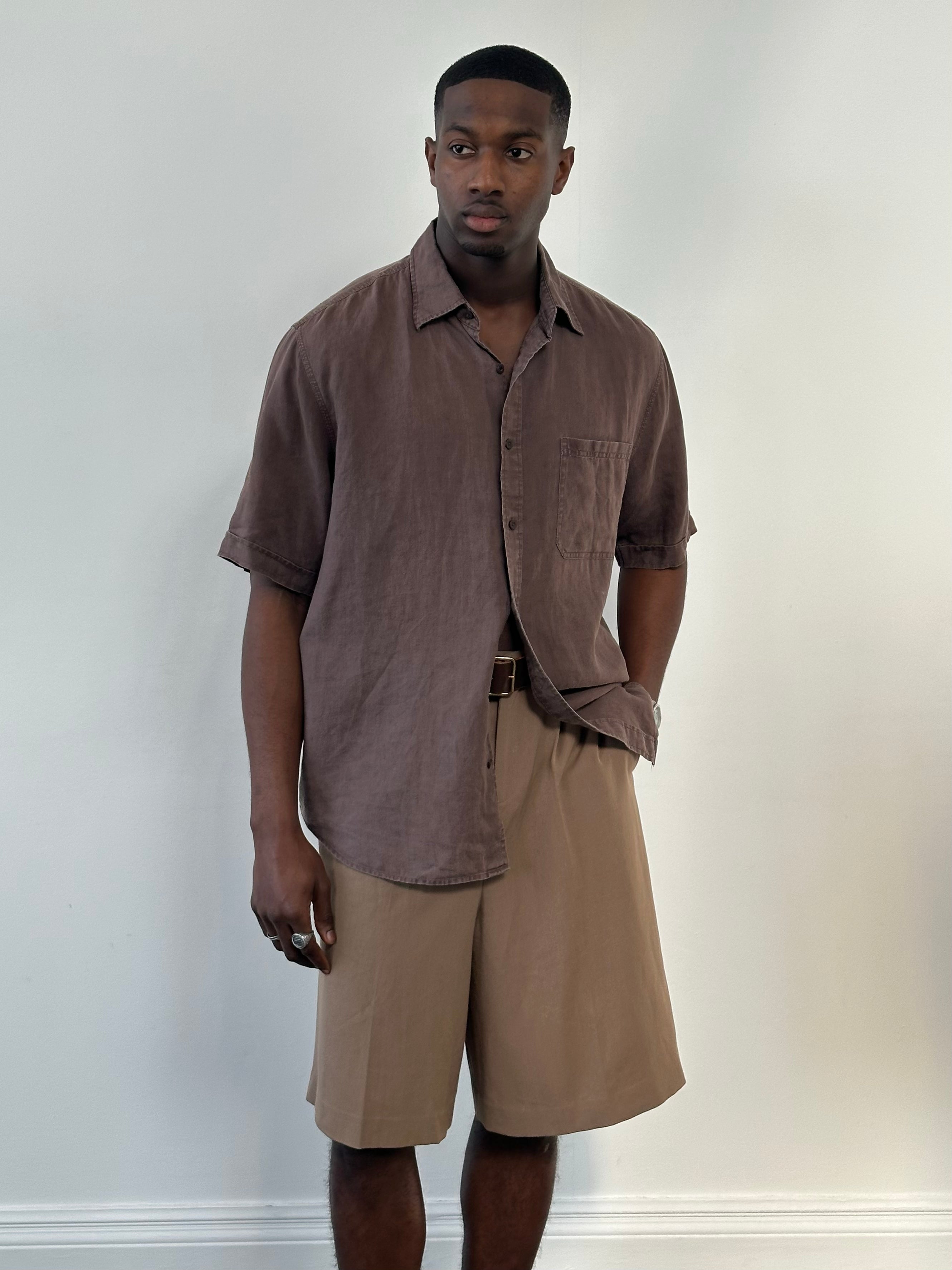 Vintage 2000s pure linen short sleeve shirt in XL size, displayed on a hanger with a casual relaxed fit.