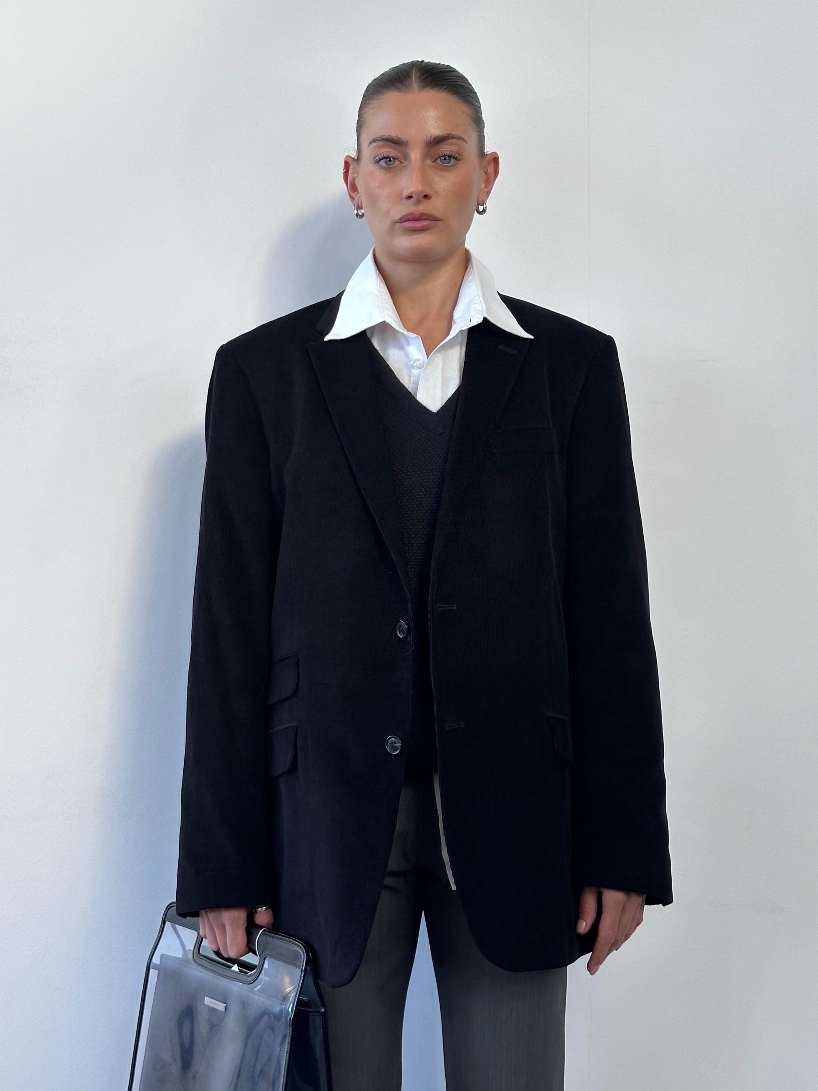 Tommy Hilfiger corduroy single-breasted blazer in size 42L/XL, shown in dark navy with classic lapel and button closure.