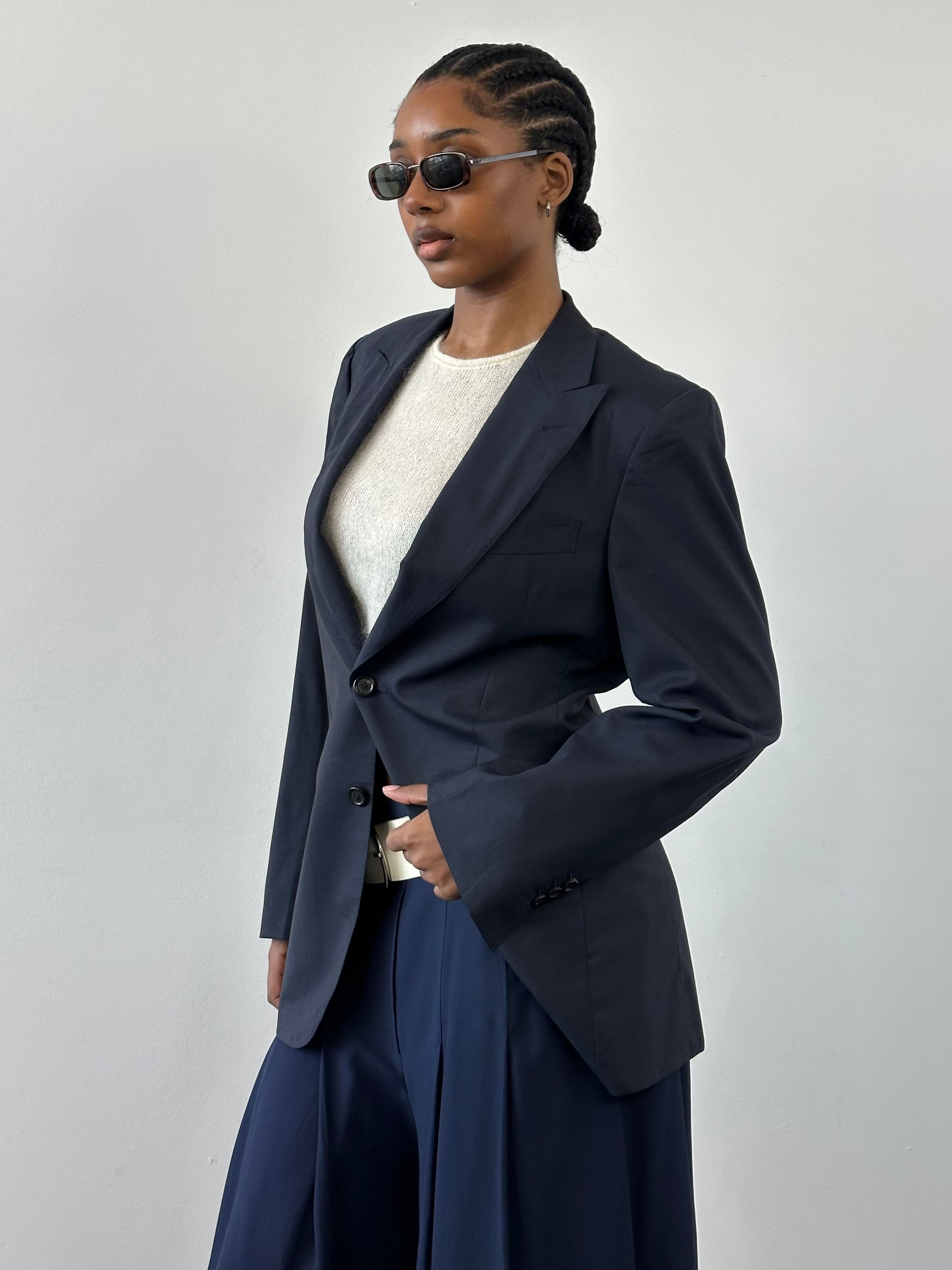 Yves Saint Laurent Rive Gauche 1990s pure wool blazer in size 36R/M, tailored fit with classic lapel and button closure.