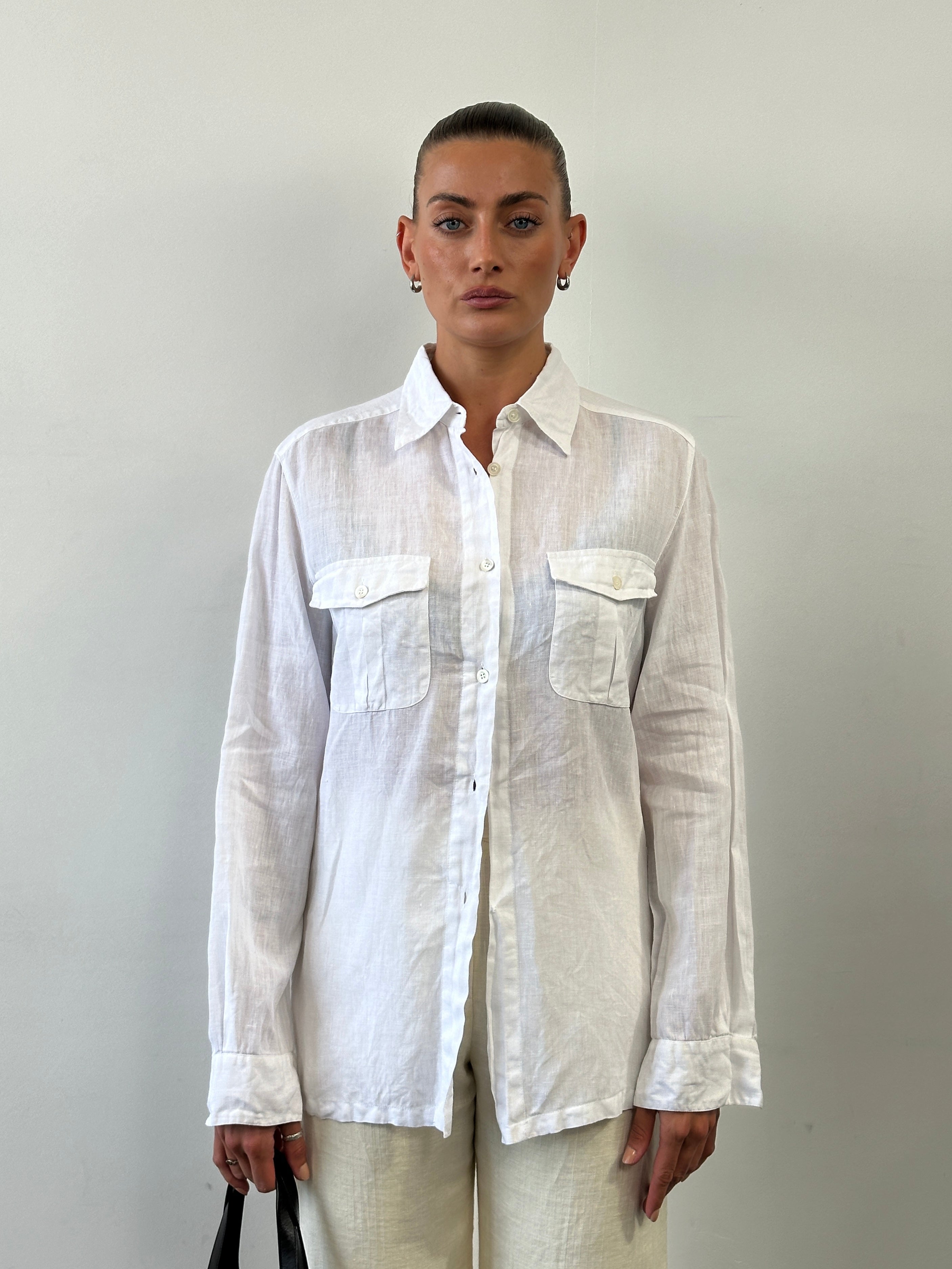 Max Mara pure linen shirt in size M/L, displayed flat with collar and button details, lightweight and breathable fabric.