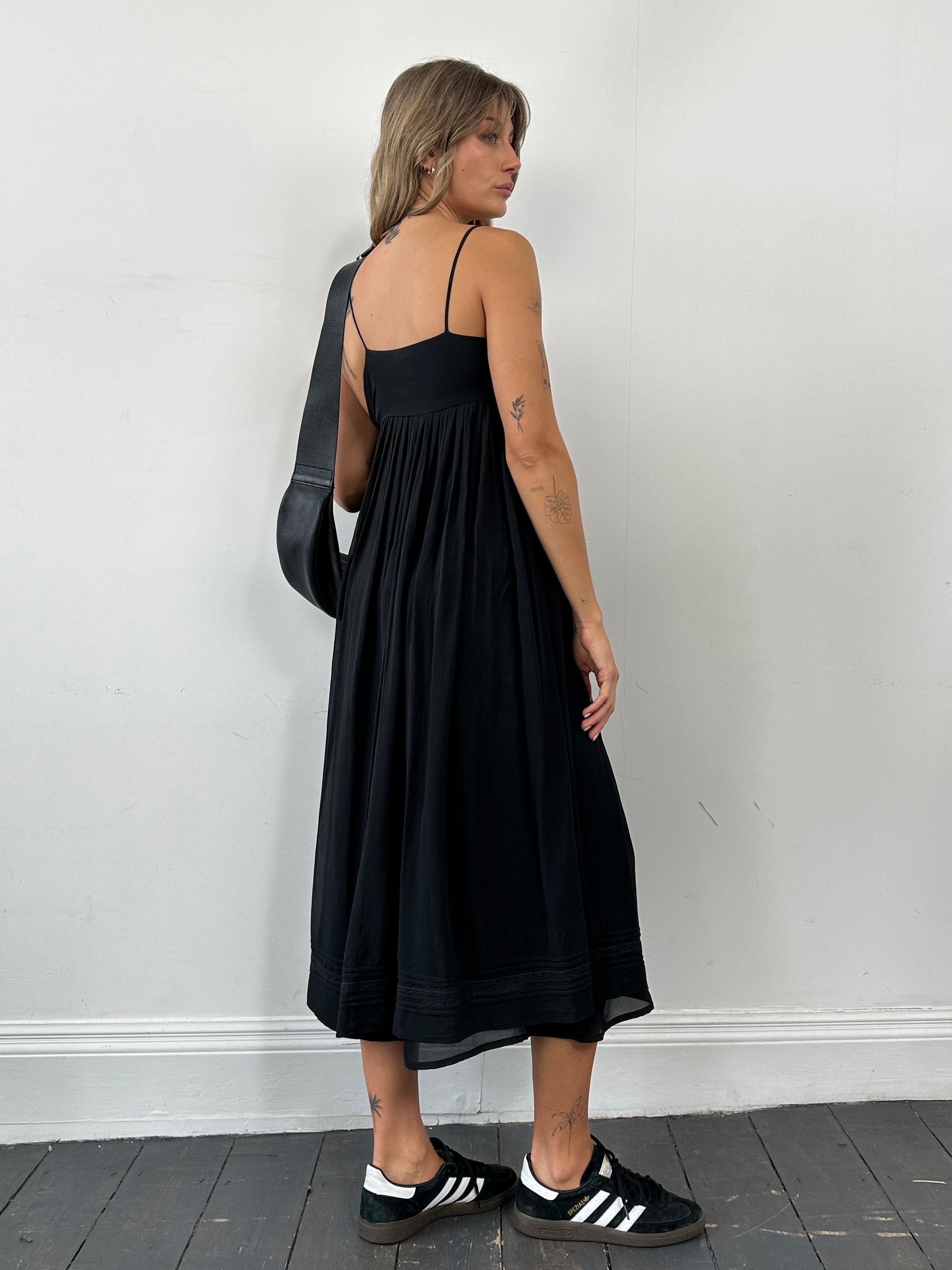 Laura Ashley pure silk pleated slip dress in XS, showcasing its elegant design and smooth fabric, perfect for stylish occasions.