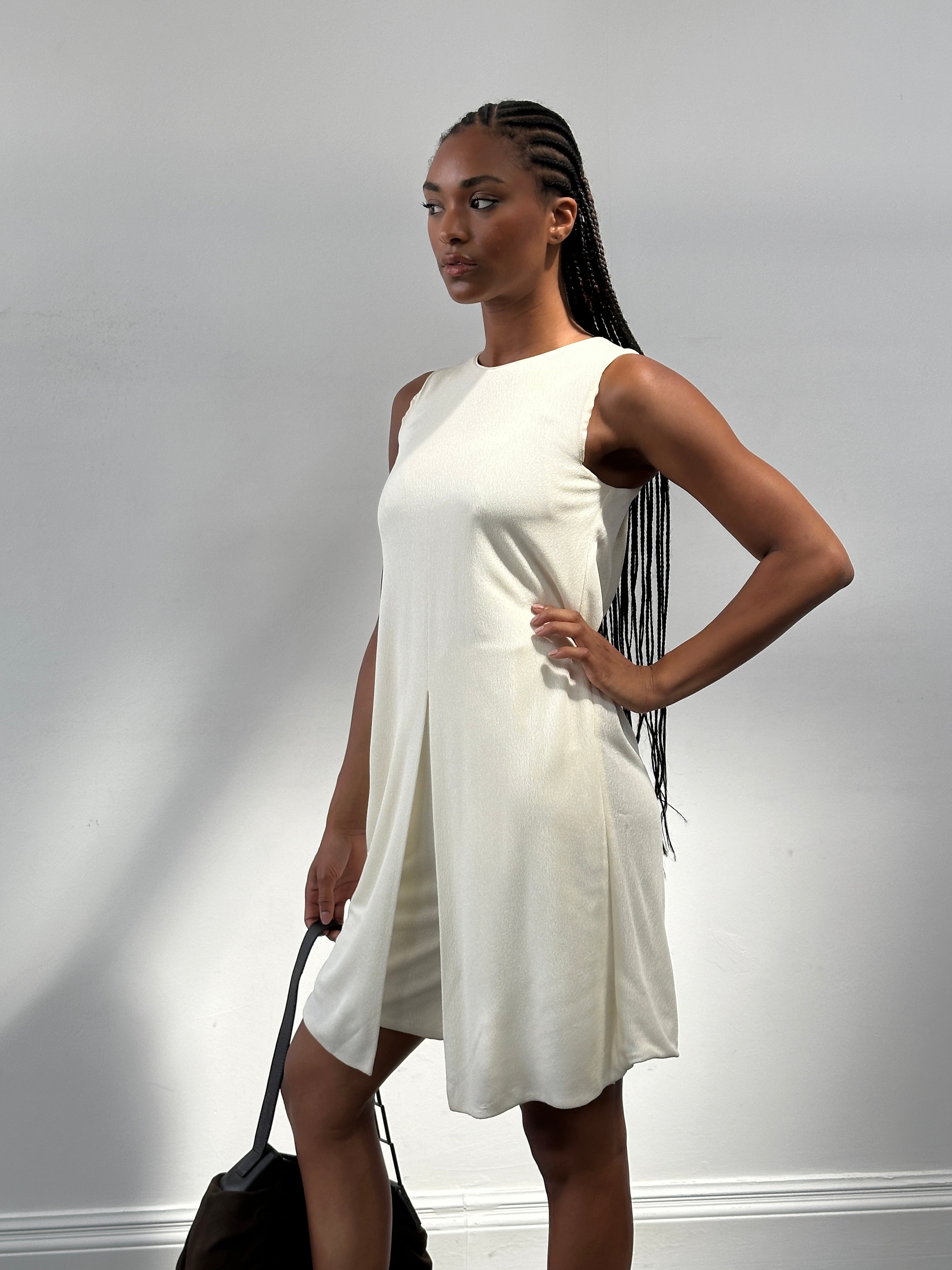 Giorgio Armani 2015 double-layered playsuit in size S, featuring sleek fabric and layered design, displayed on a hanger.