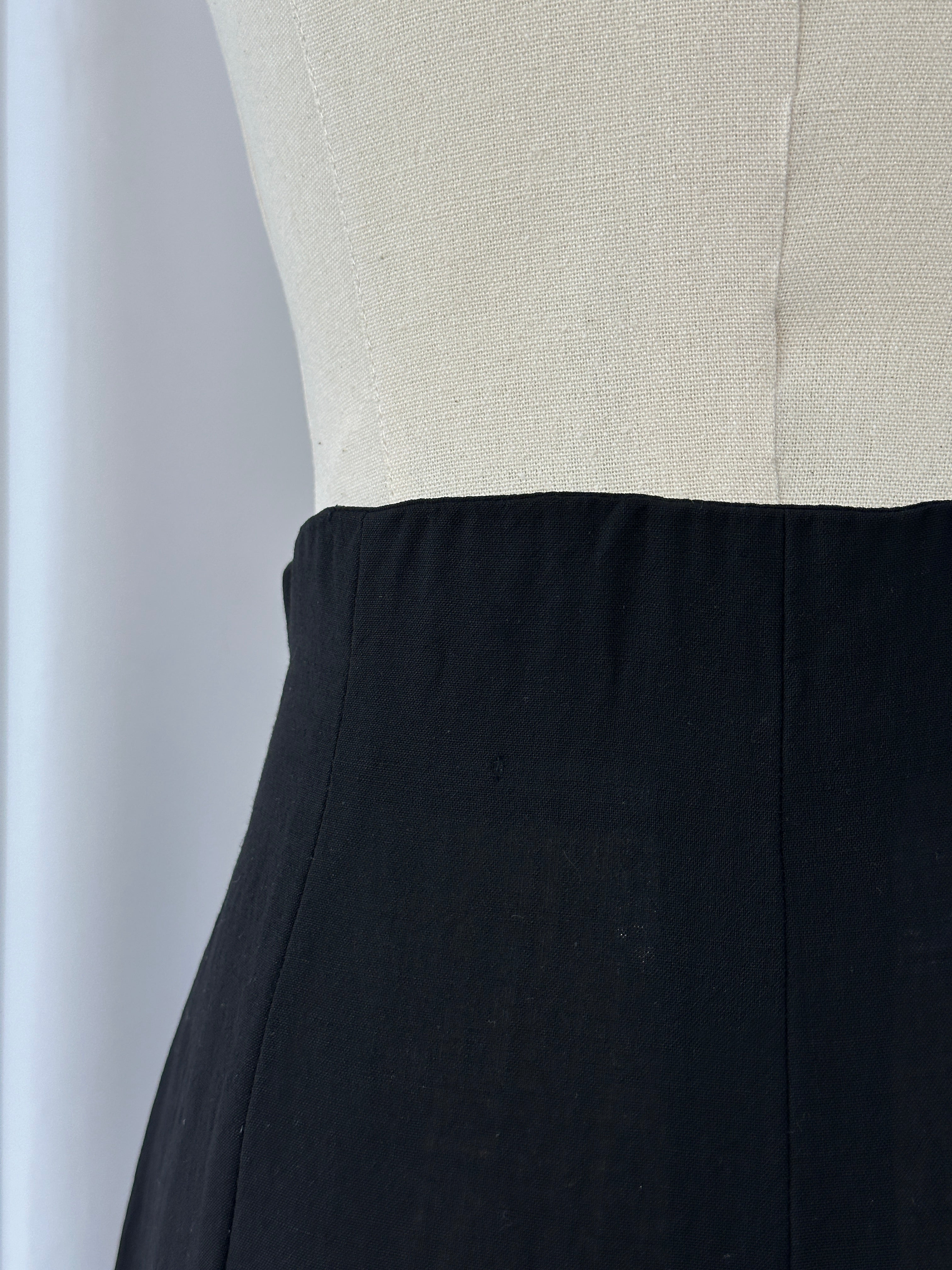 Max Mara 1990s wool high-waisted straight leg tailored trousers in W24, shown on a model, featuring classic design and neutral color.