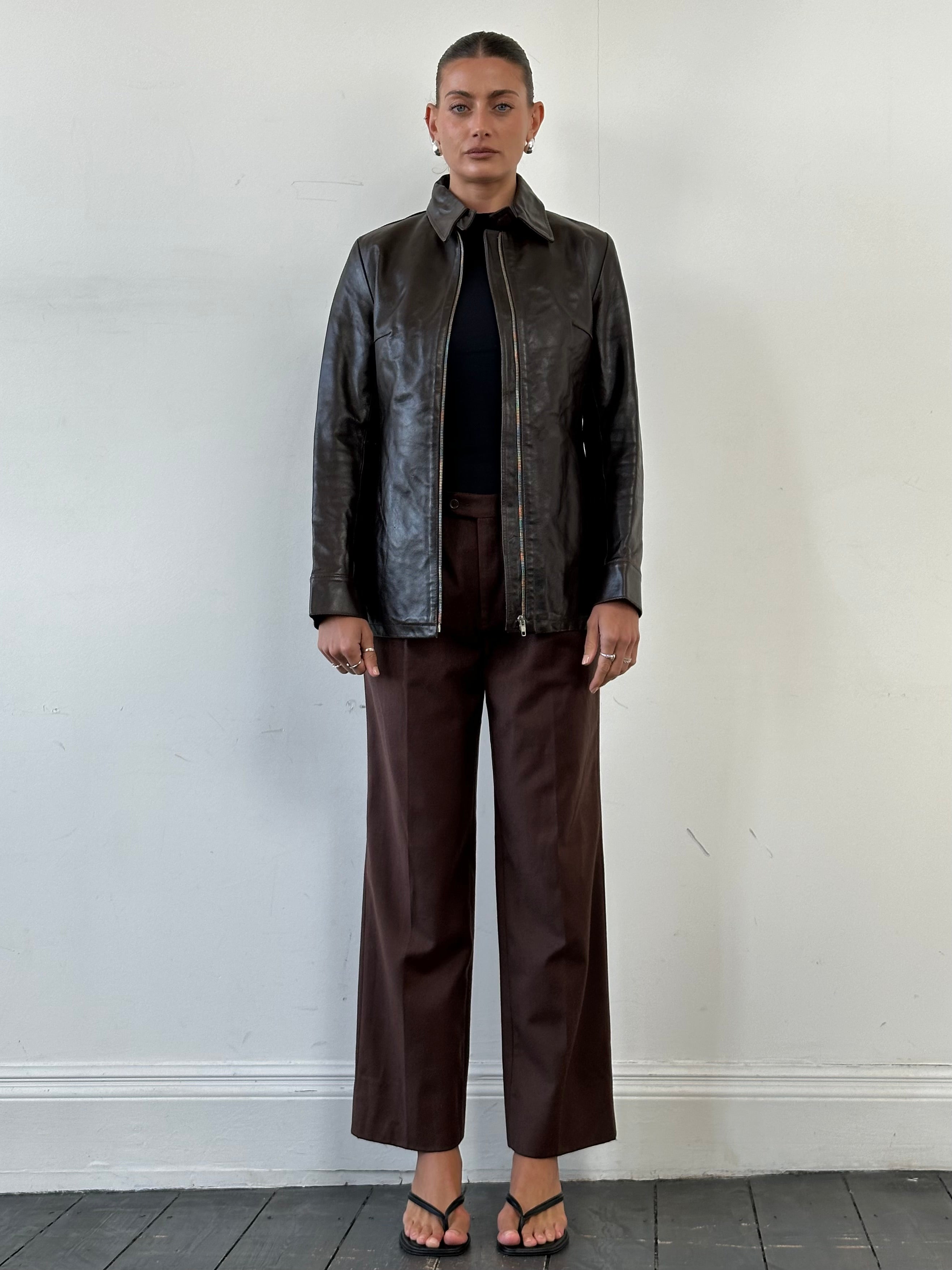 Vintage Italian straight leg wool trousers in brushed pure wool, size W32, featuring classic tailored design and neutral color.