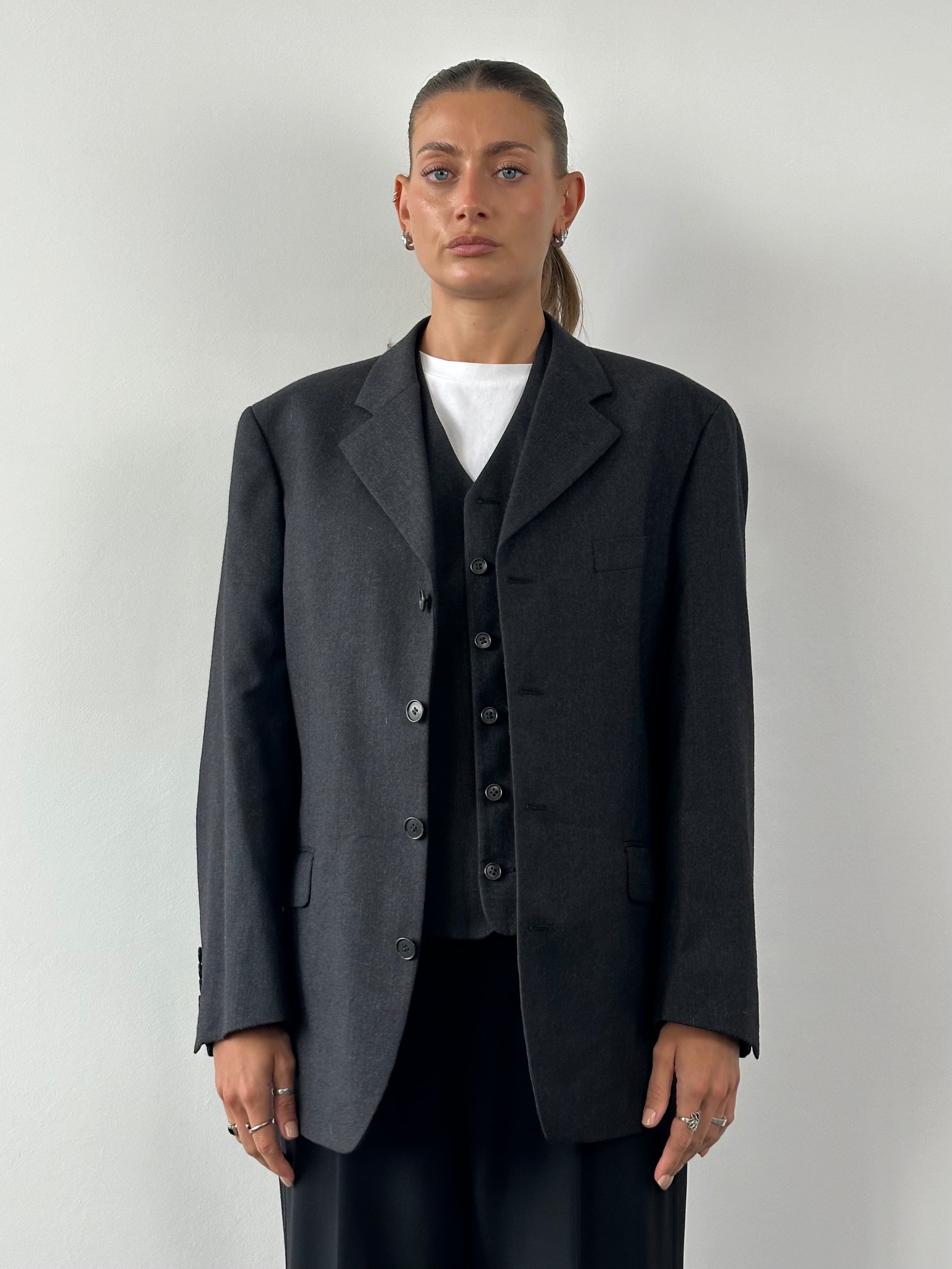 Yves Saint Laurent Pour Homme pure wool blazer and matching trousers in size 40S/L, tailored, navy blue, formal men's suit set.