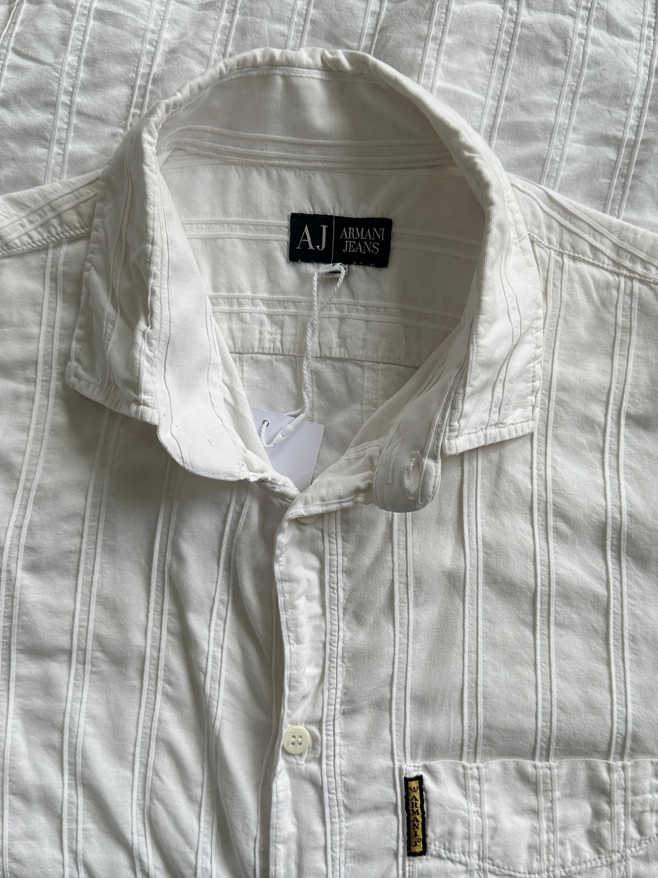 Armani Jeans cotton pintuck shirt in size M, featuring a classic design with pintuck details, suitable for casual or smart-casual wear.