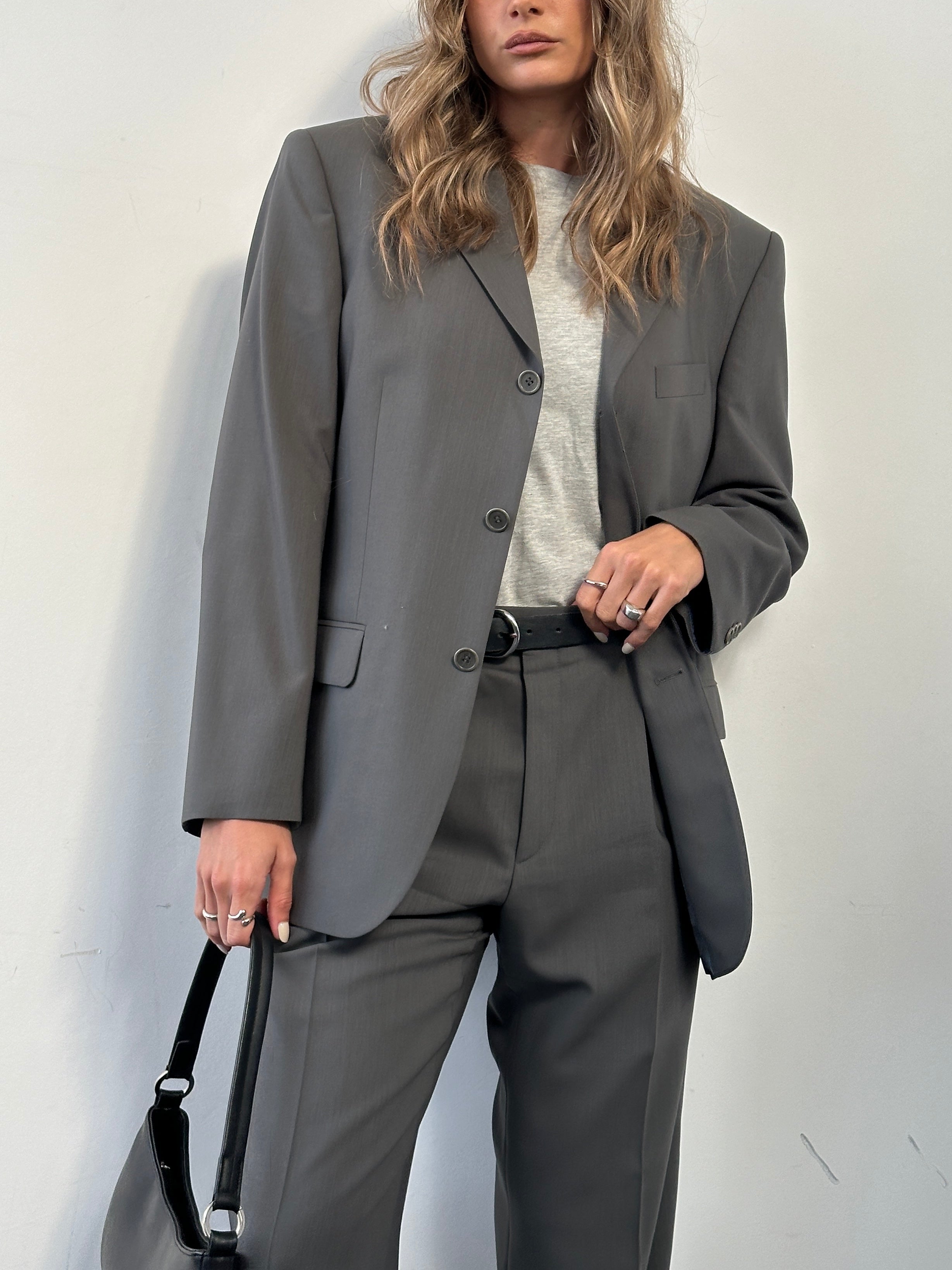 Balmain pure wool single-breasted suit jumpsuit in size 38S/W32, featuring tailored fit and classic lapel design.
