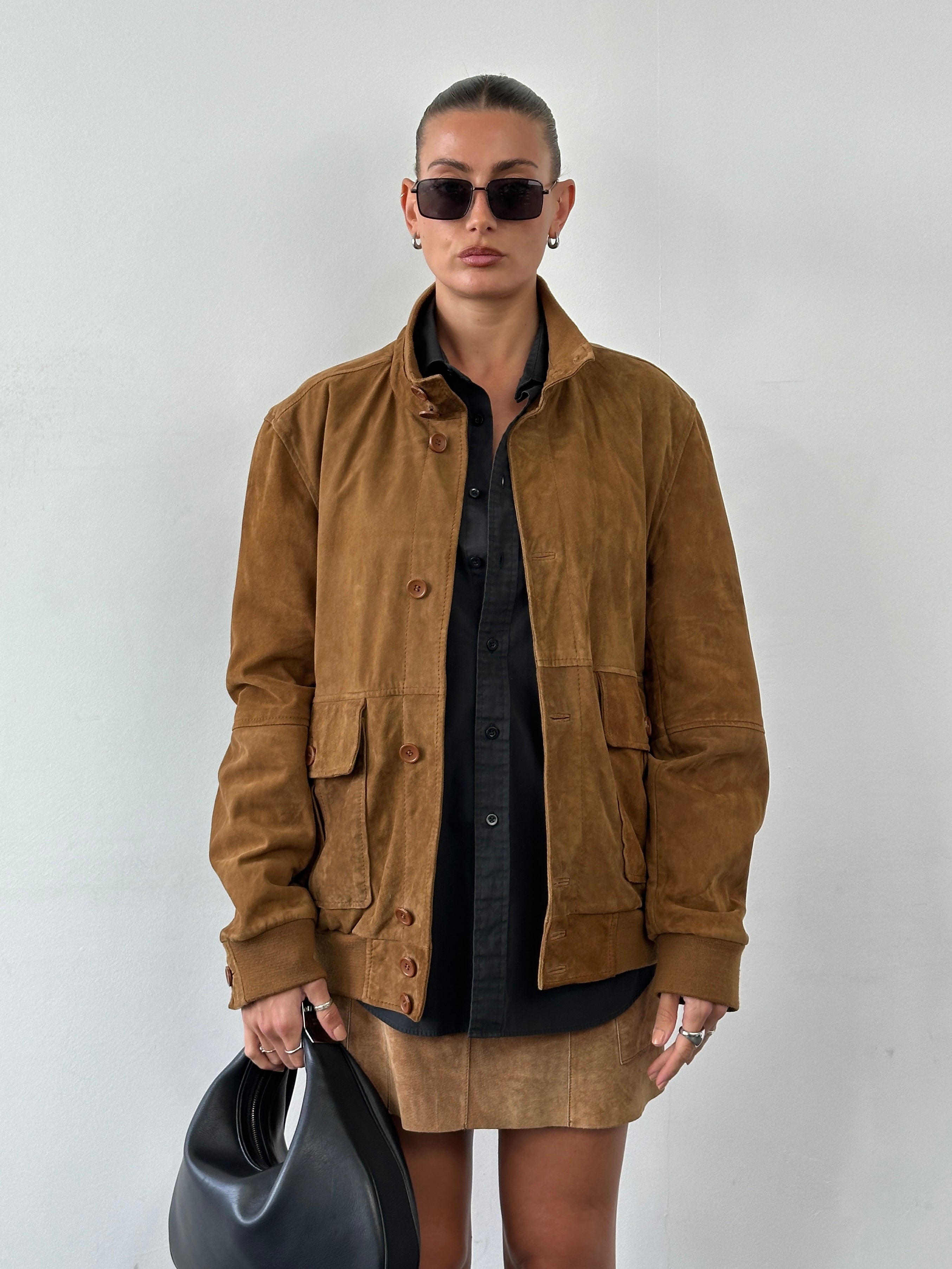 ARMA suede bomber jacket in size L, featuring a classic design with a soft suede texture and ribbed cuffs and waistband.