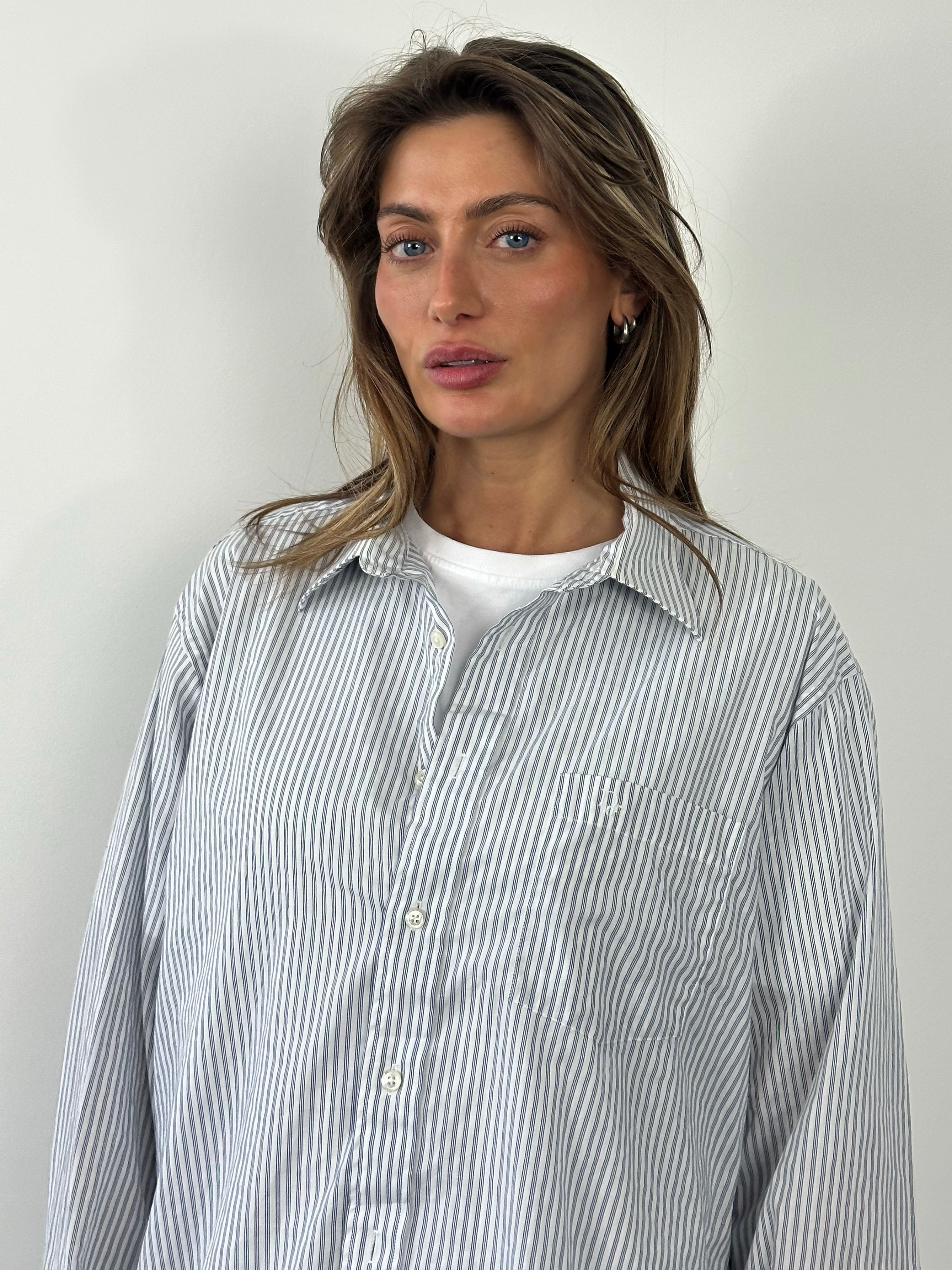Christian Dior 1990s cotton striped logo shirt in size L, featuring classic Dior branding and a casual button-up design.