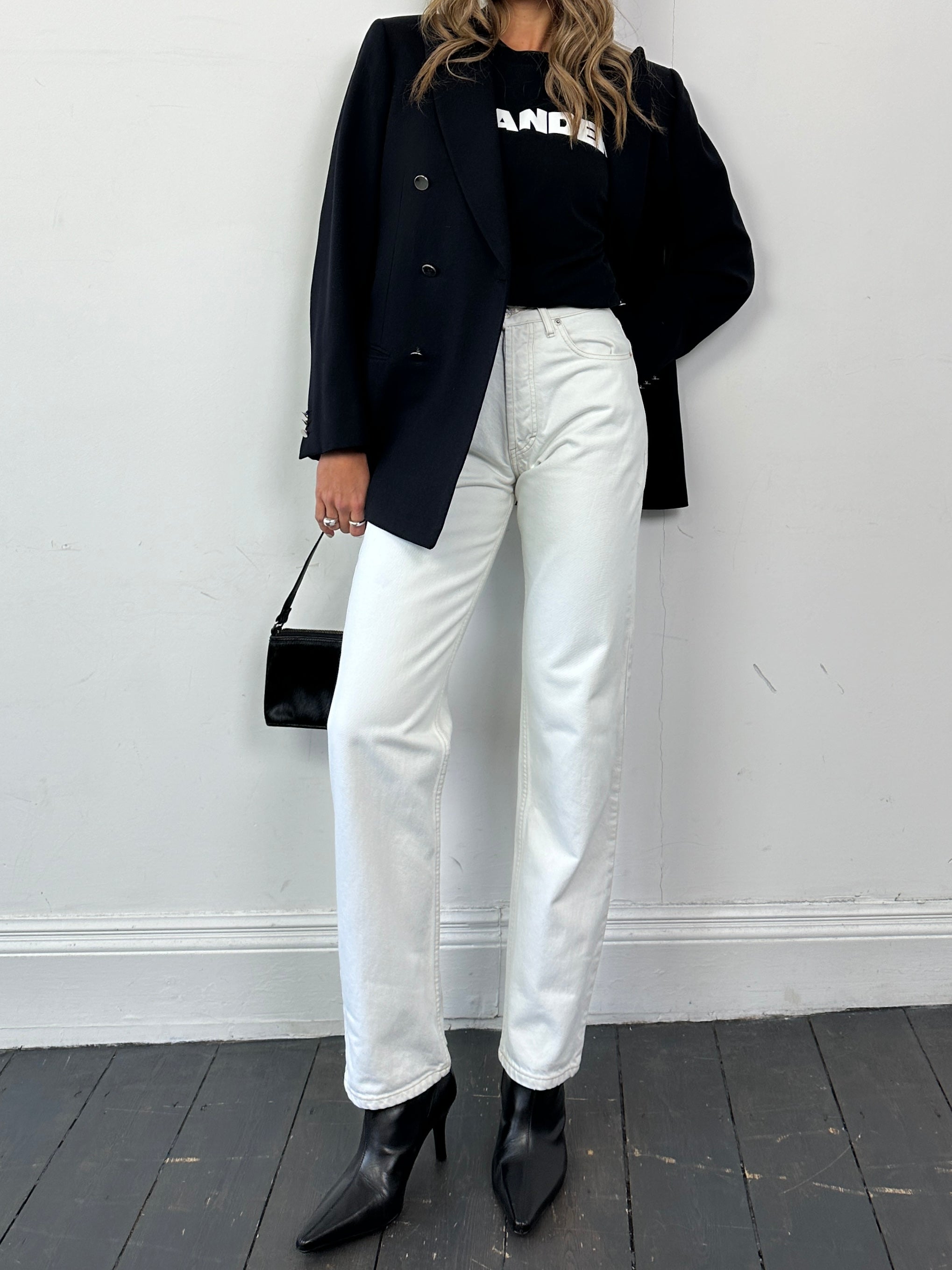 Vintage denim straight leg jeans in size W26, displayed flat with classic blue wash and subtle fading.