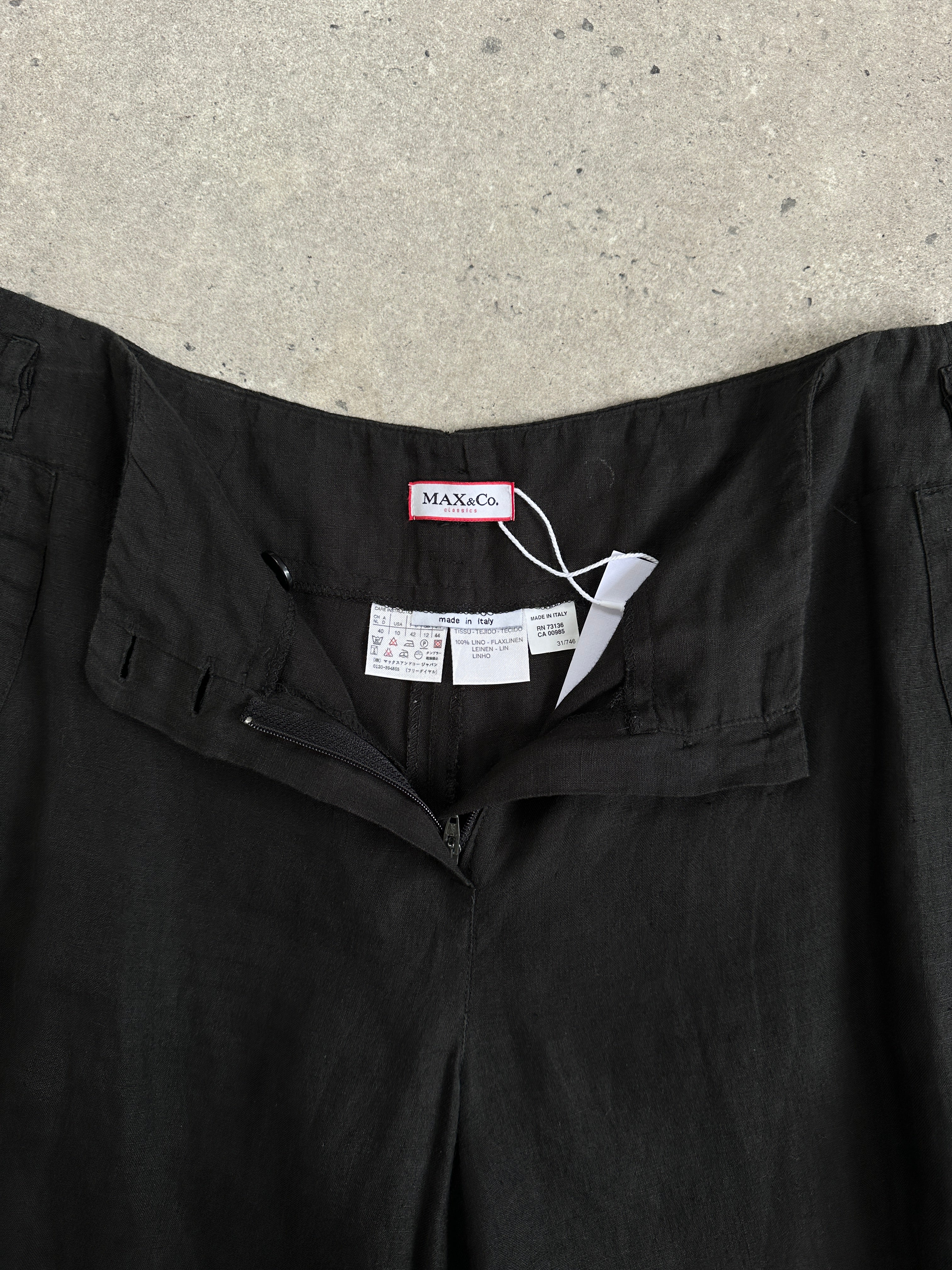 MAX & Co pure linen wide-leg trousers in mid-rise fit, shown in light fabric with belt loops and relaxed style.