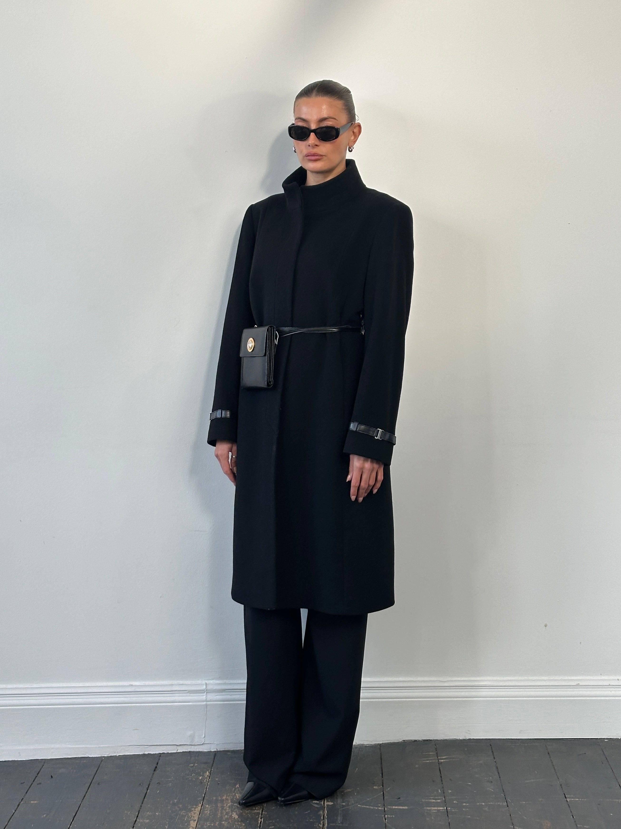 Vintage 1990s wool high neck coat in size large, showcasing classic design and warm fabric, with a high collar and tailored fit.