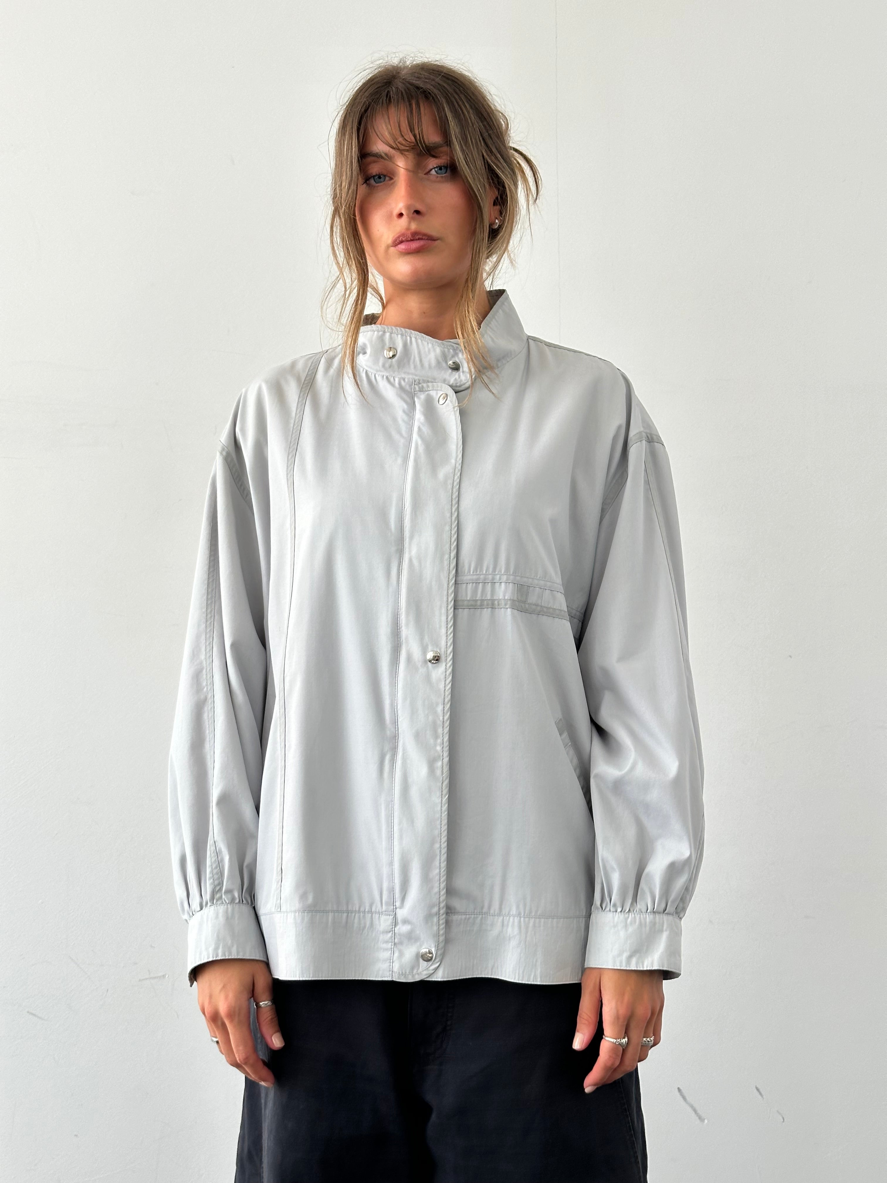 Vintage 2000s high neck bomber jacket in XL, featuring a classic design with a structured fit and vintage style.
