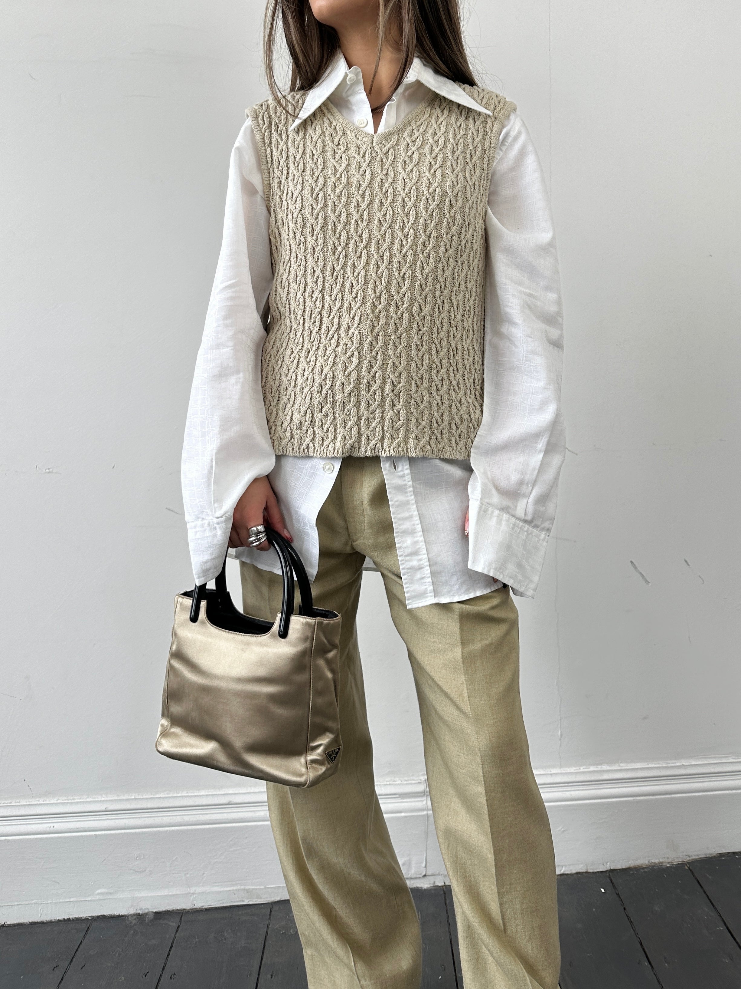 Vintage cotton Aran knit vest in S/M size featuring textured pattern and classic design, perfect for layering and casual wear.