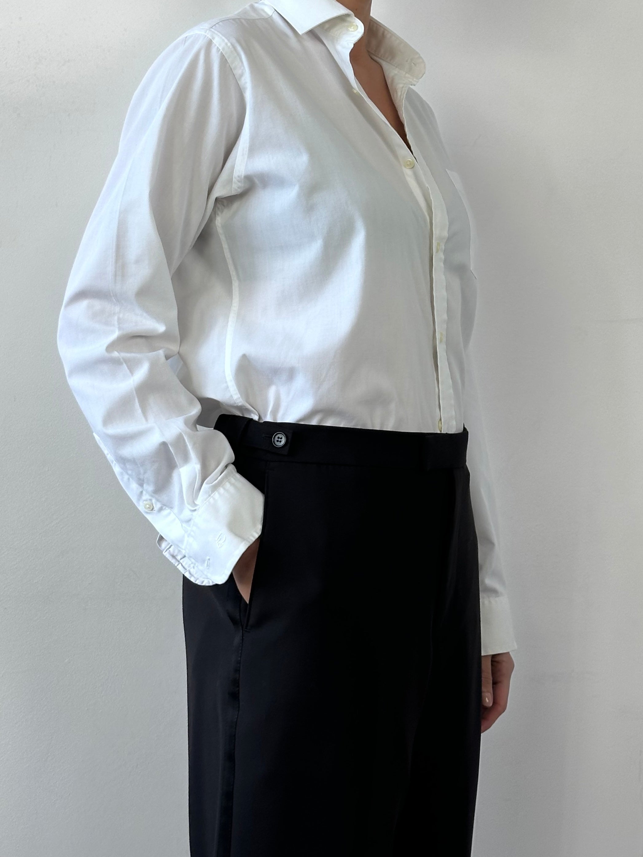 Balmain pure wool tuxedo tailored trousers in black, front view showing sleek fit and classic design, size W30-32.