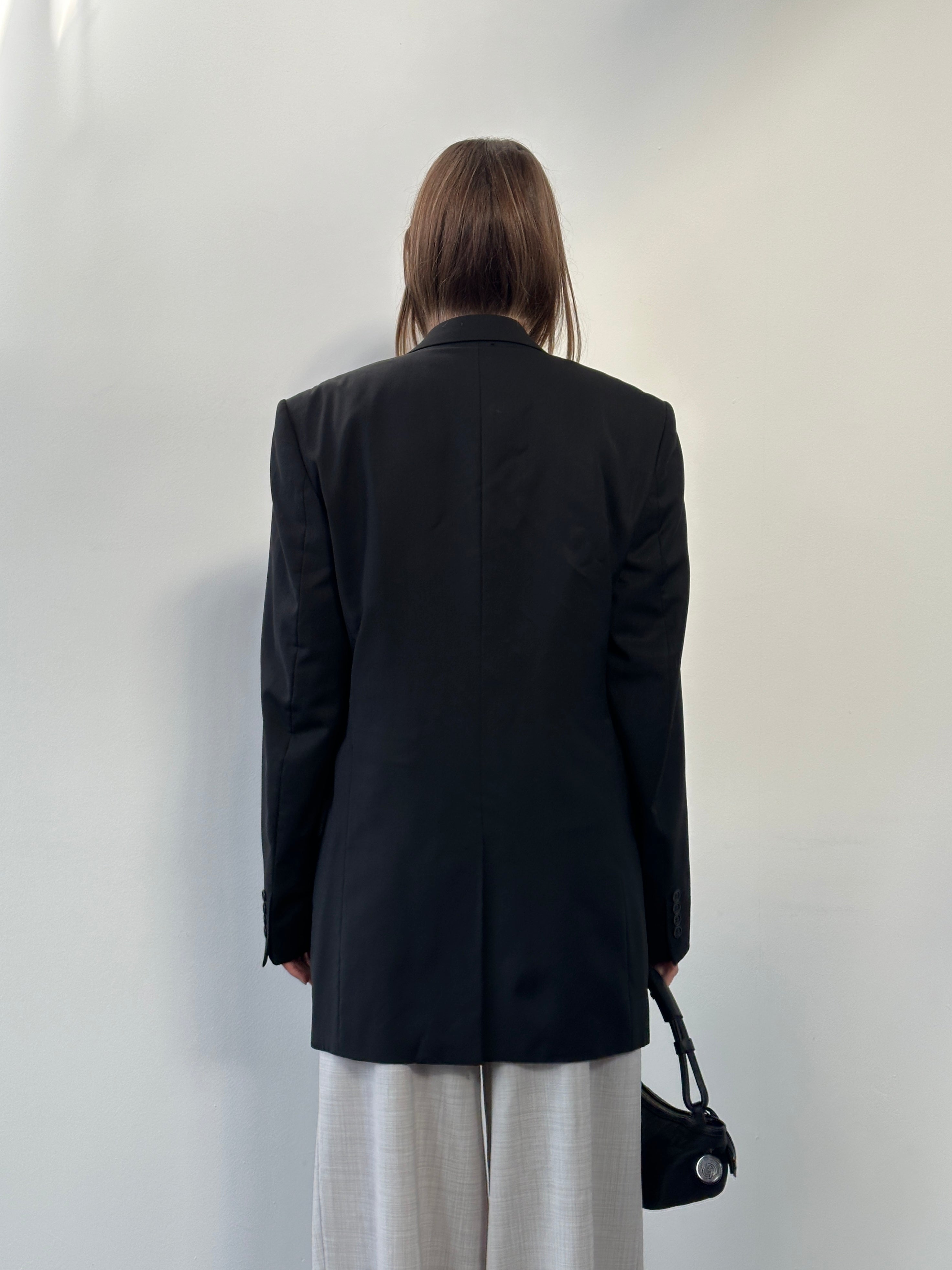 Yves Saint Laurent men's 1990s pure wool single-breasted blazer in size 40L/XL, tailored fit with classic lapels and dark navy color.
