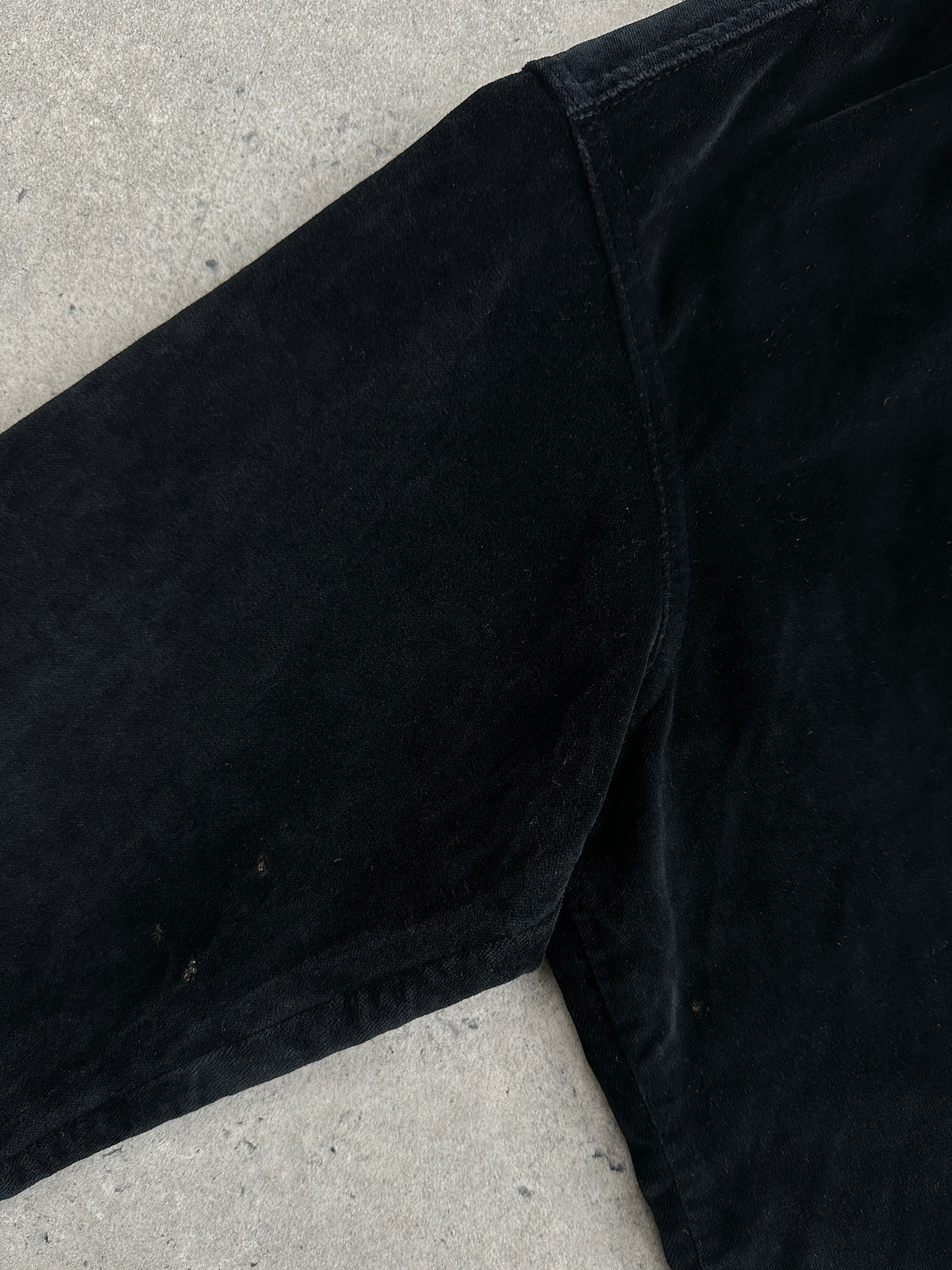 Vintage Italian 1990s velvet shirt in size M, featuring rich fabric and classic design, displayed on a hanger.