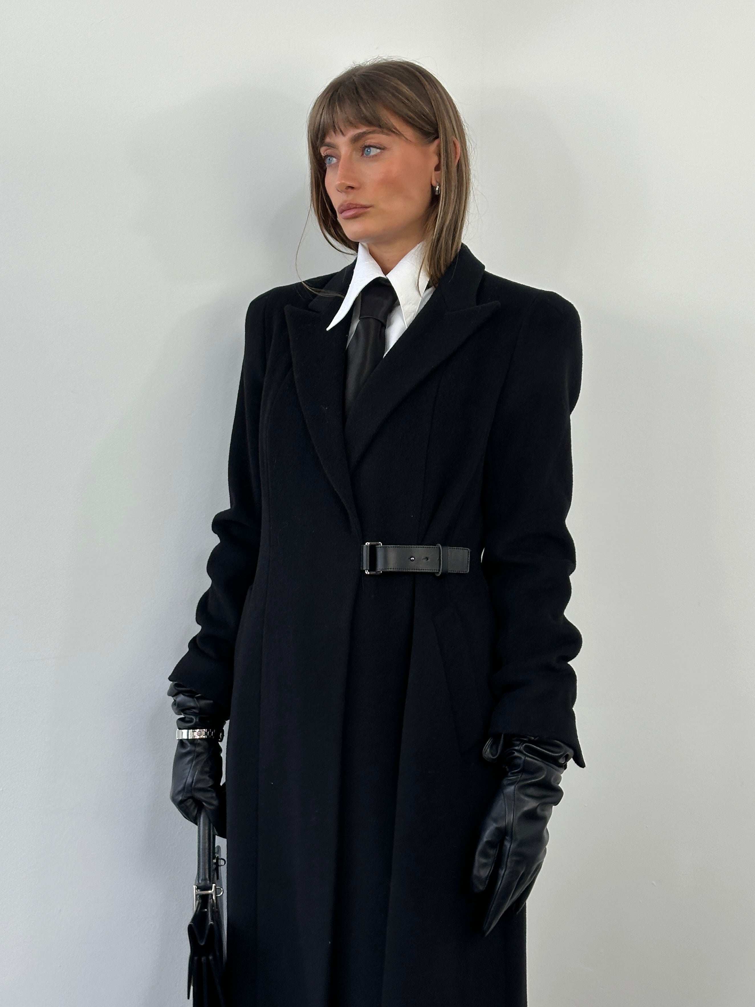 L.K. Bennett pure wool minimal wrap coat in size M, shown in beige, with clean lines and a classic collar, displayed on a hanger.