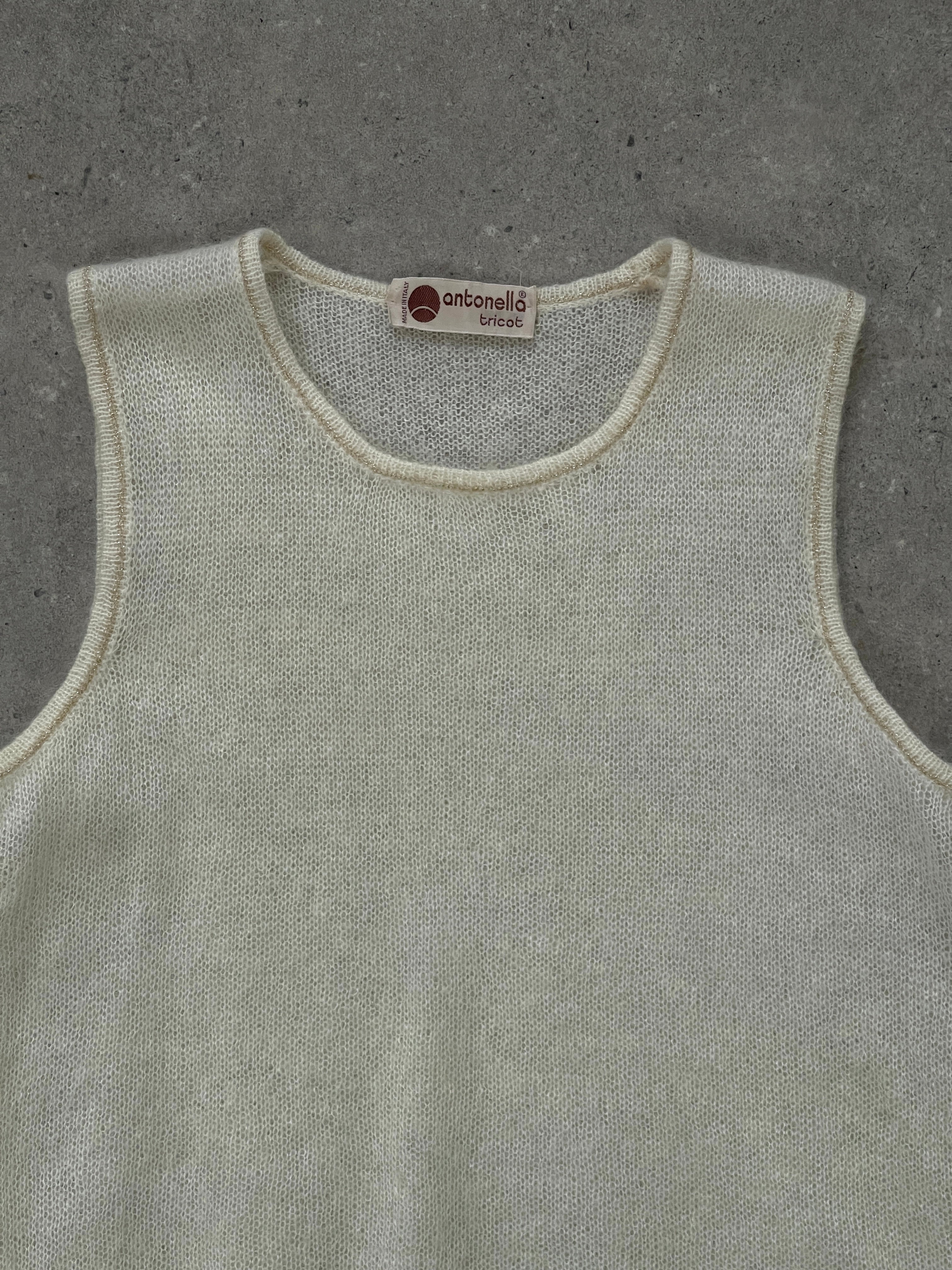Vintage Italian 1990s mohair knit top, light cream color, fitted style, soft textured fabric, size small.