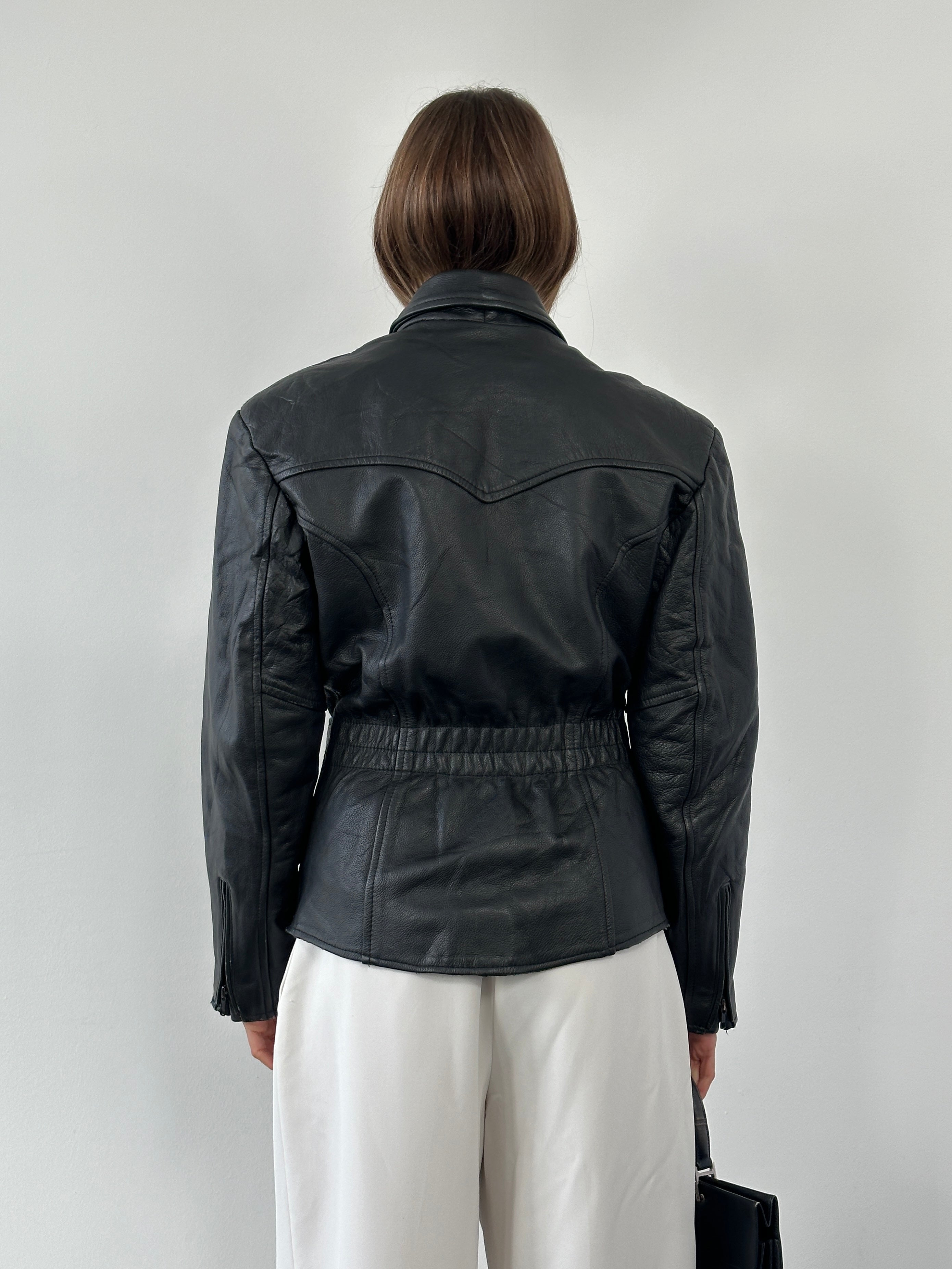 Vintage 1990s high neck belted leather jacket, size M, featuring classic leather texture and vintage style details.