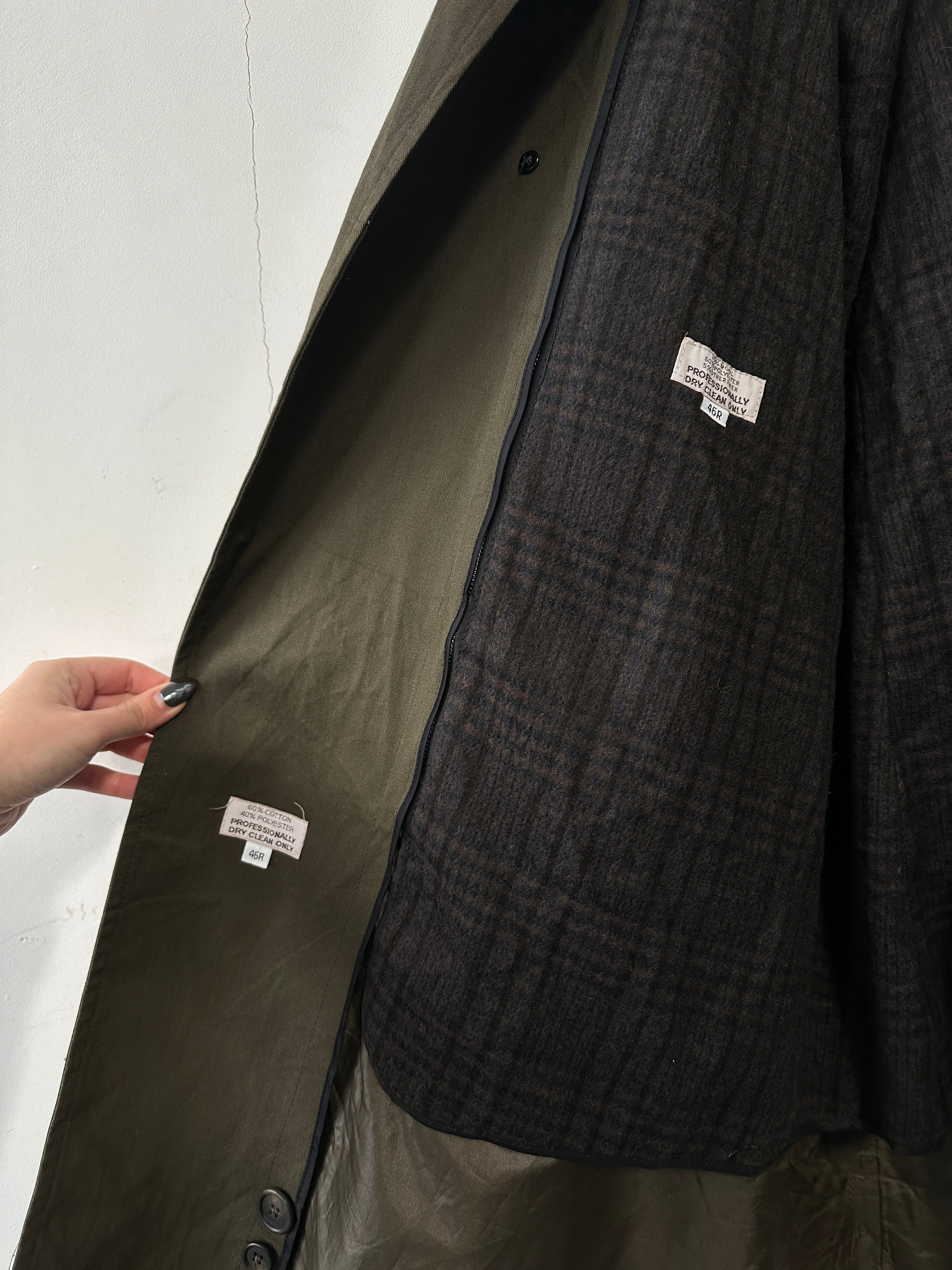 Christian Dior cotton double-breasted trench coat in XL, shown on a hanger with classic design and beige color.
