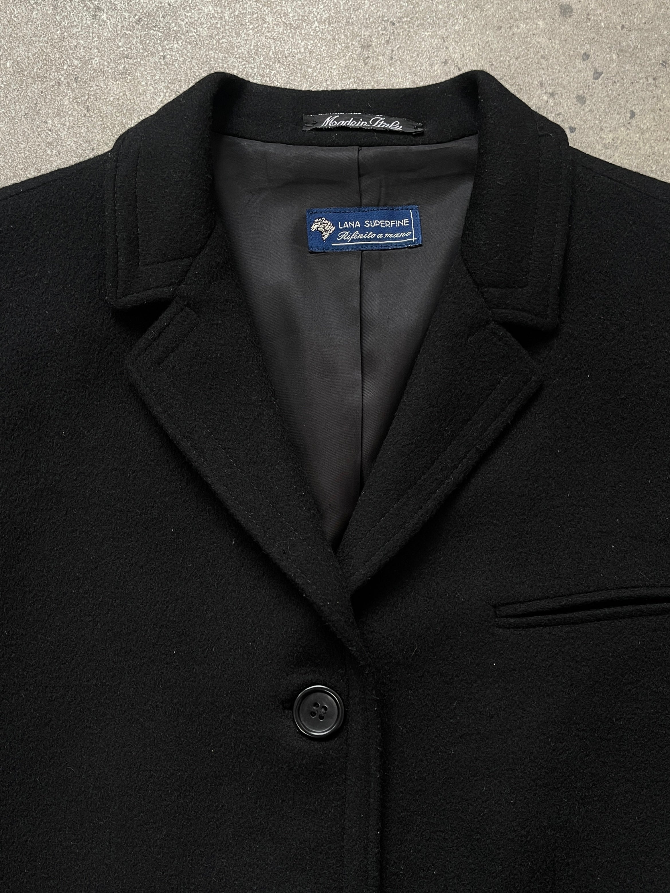 Vintage Italian 1990s wool and cashmere single-breasted coat, medium size, classic vintage style, shown on a hanger.