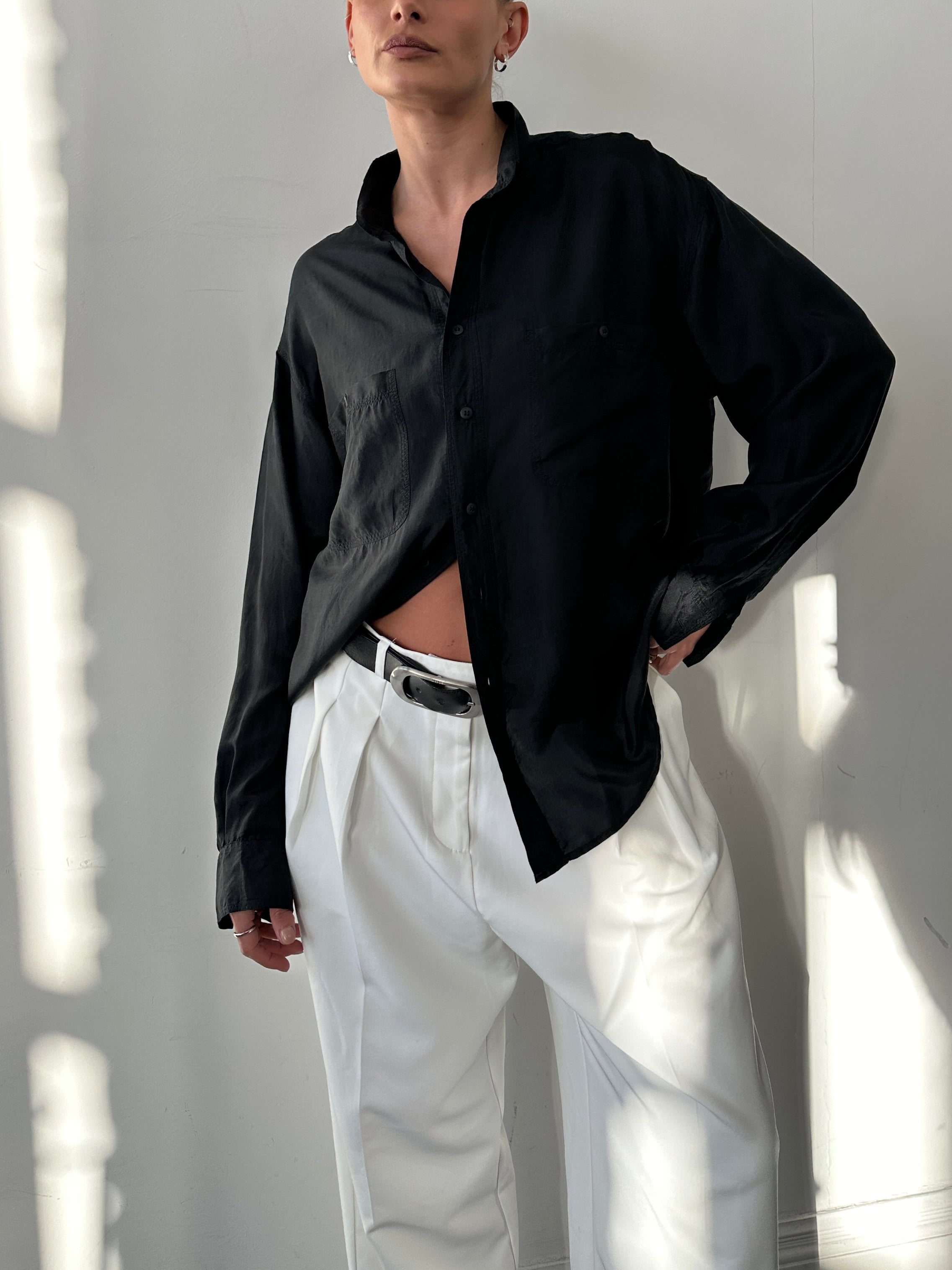 Vintage pure silk shirt in size L/XL, featuring a classic design with a smooth, shiny fabric and elegant collar details.