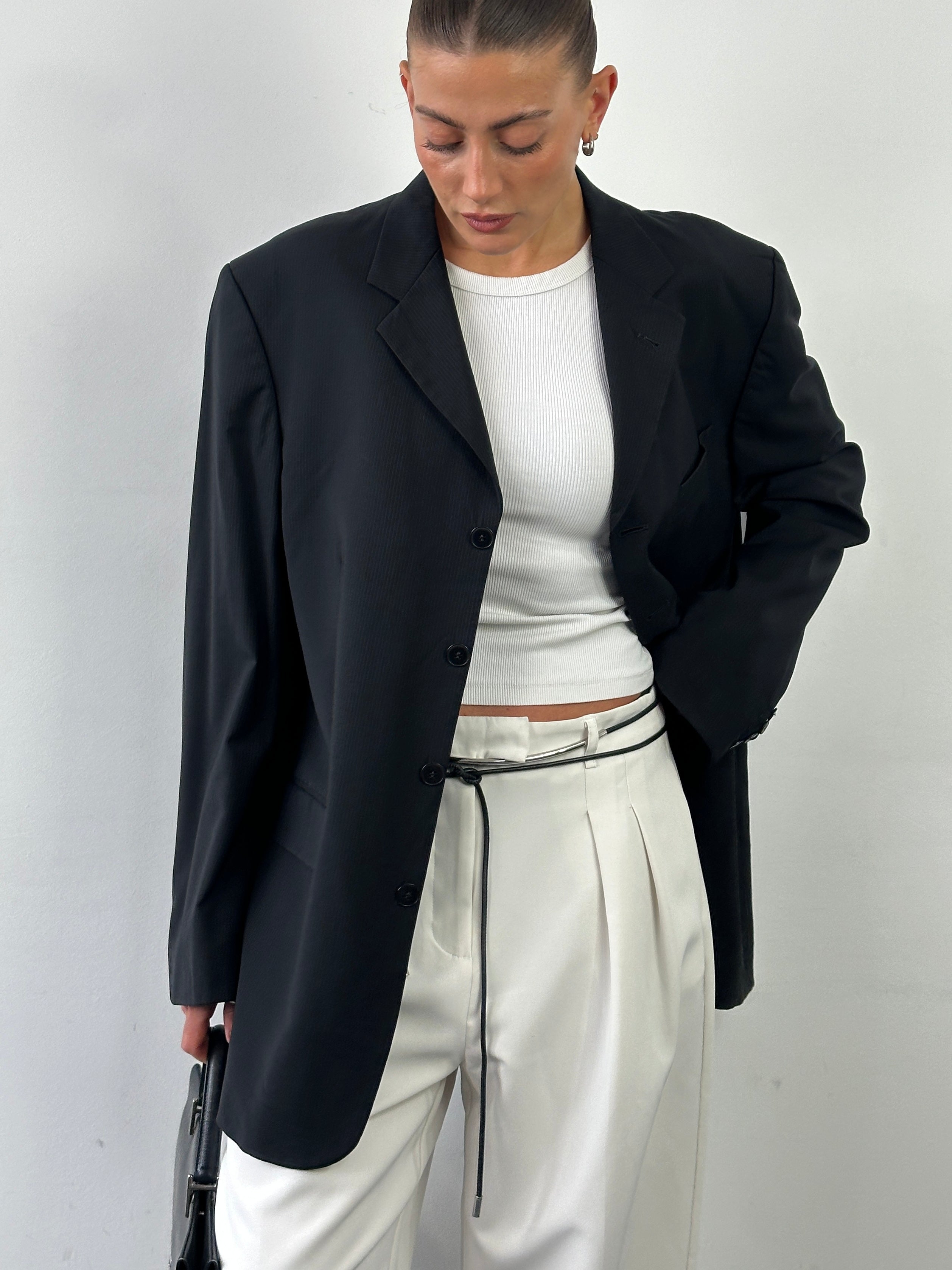 Yves Saint Laurent Pour Homme 1990s pure wool pinstripe blazer, size 42R/XL, tailored with classic lapels and button closure.