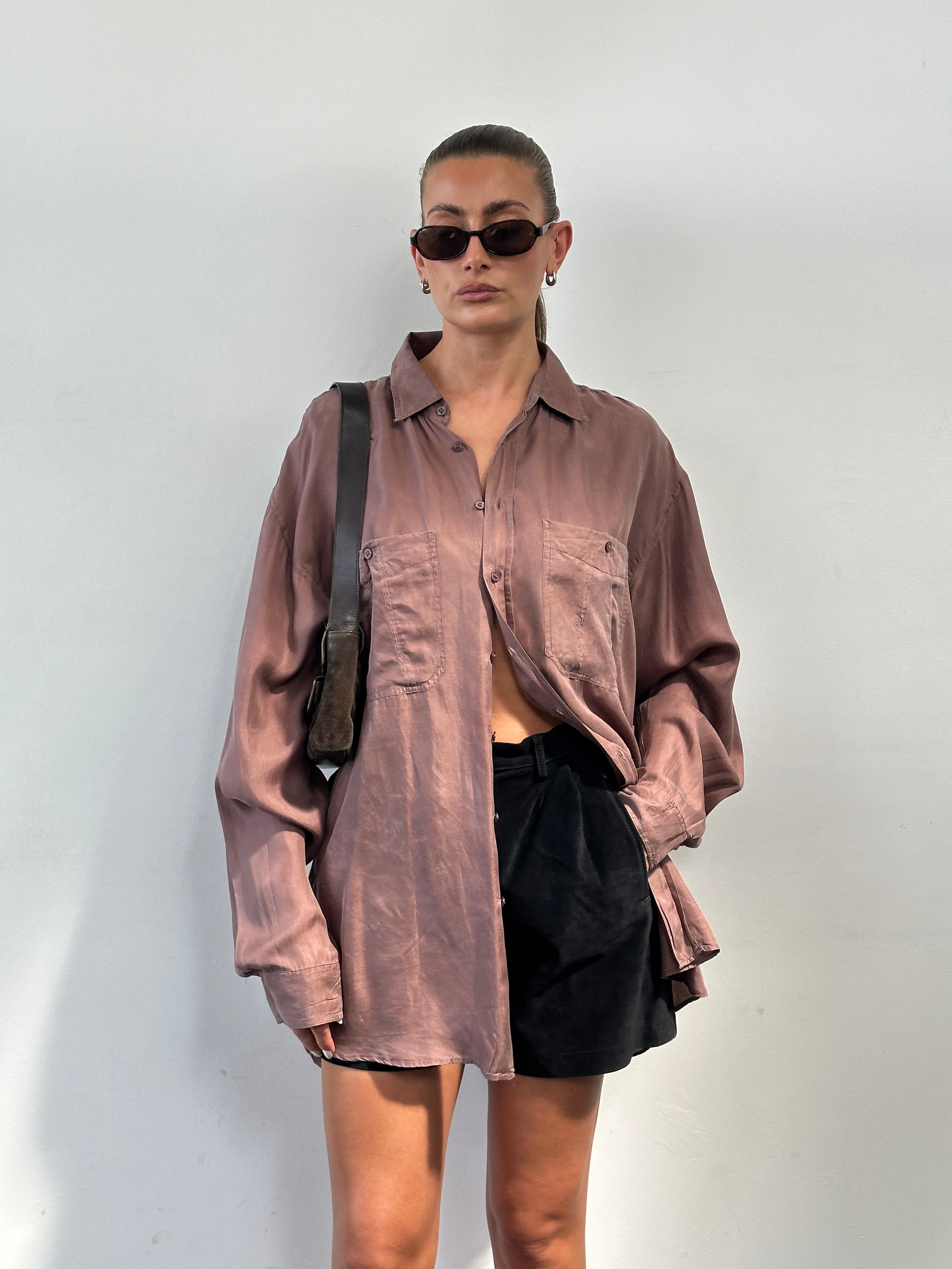 Vintage 90s pure silk shirt in XL size, featuring a classic design and smooth fabric, displayed on a hanger.