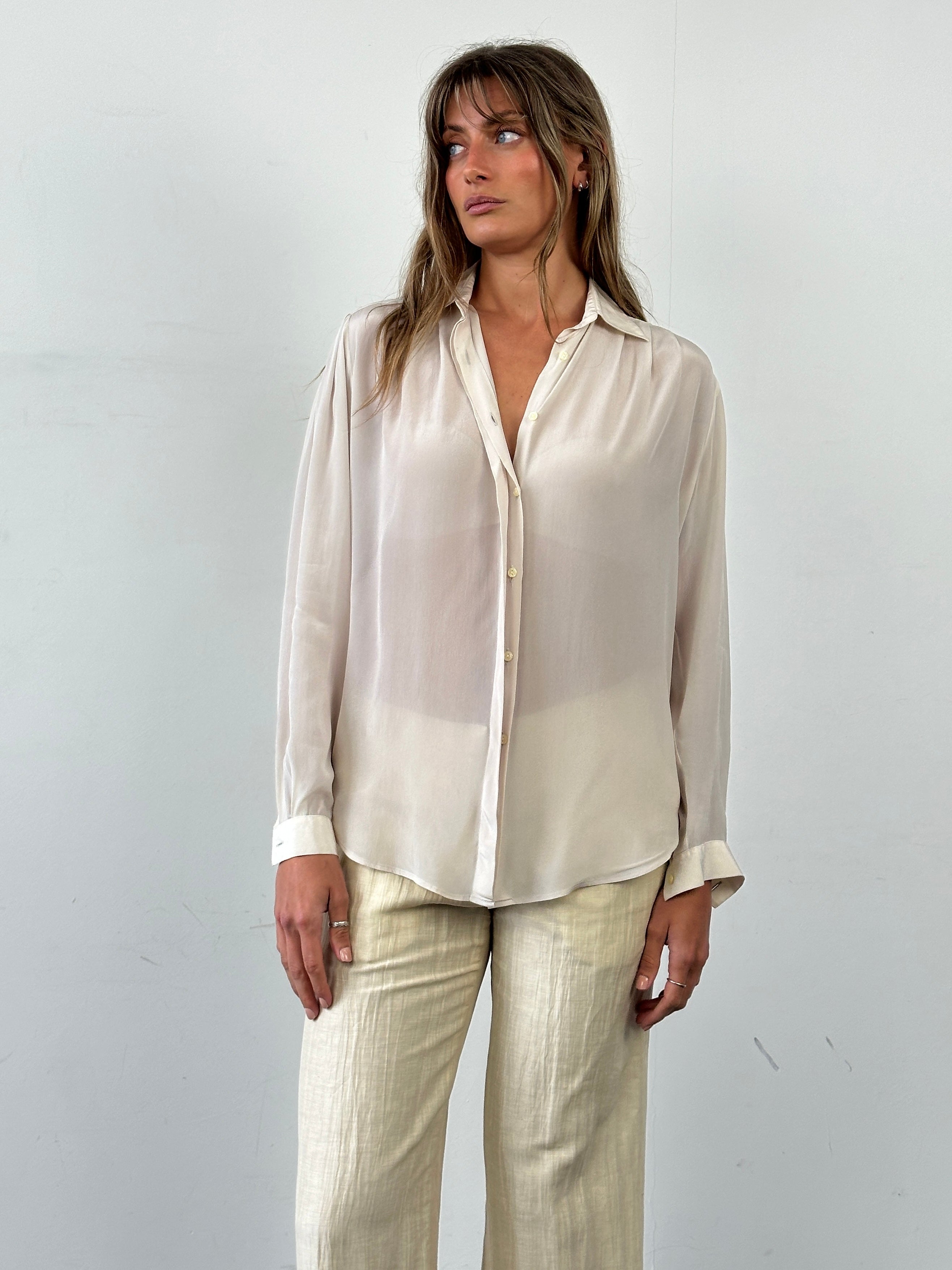 Vintage Italian vintage silk pleated shirt with concealed placket, size M, featuring elegant design and fine silk fabric.