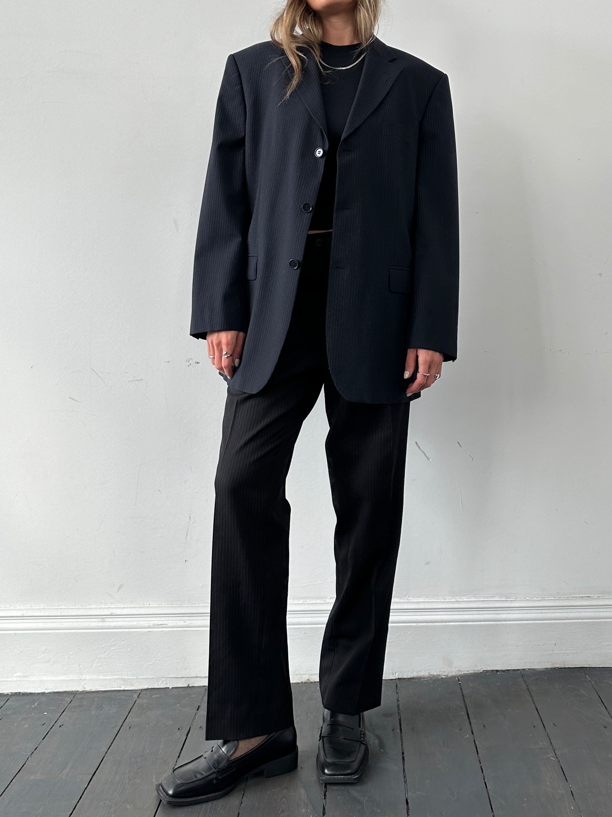 Balmain pinstripe wool blazer in size 42R/XL, single-breasted design with notch lapel and tailored fit, front view.
