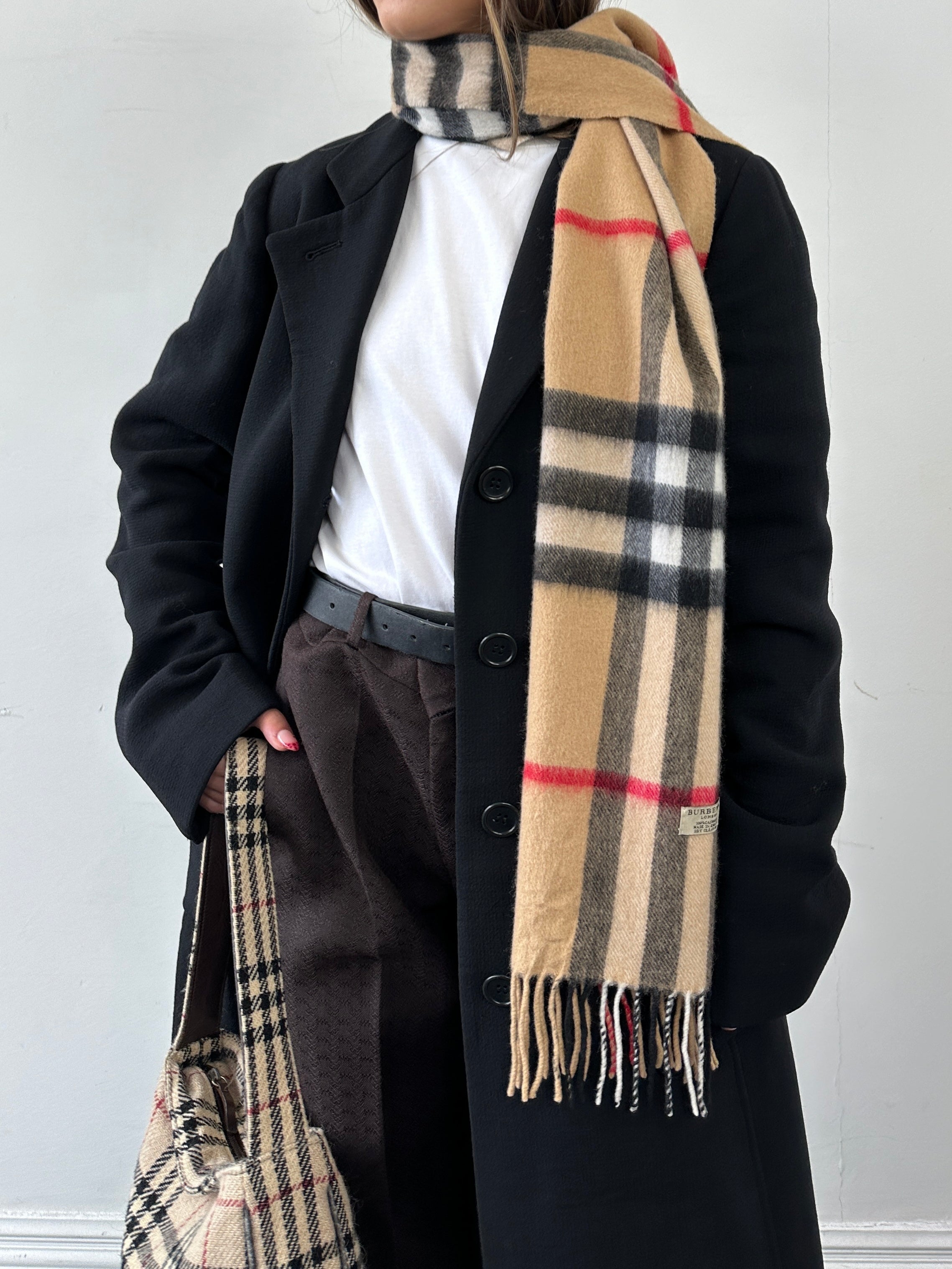 Burberry London pure cashmere Nova Check scarf featuring classic check pattern in beige, black, and red tones.