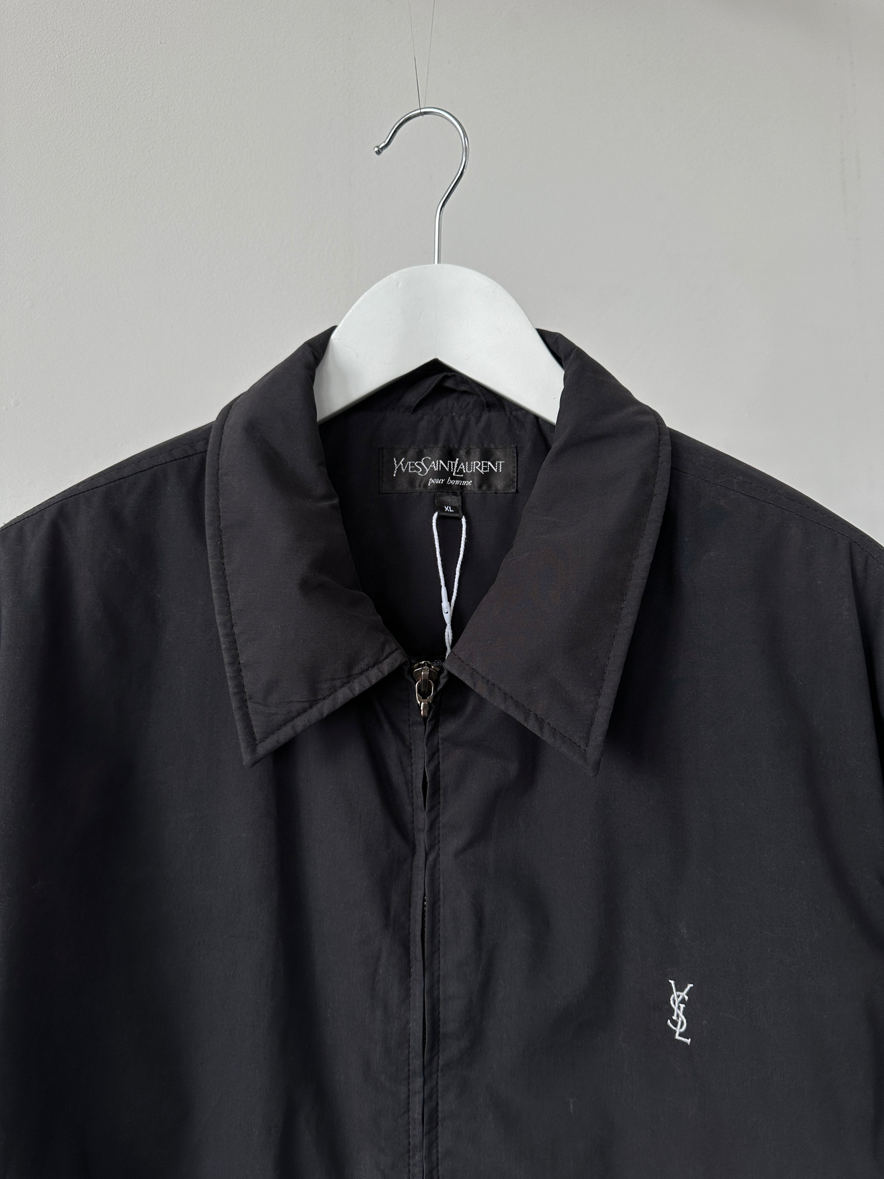 Yves Saint Laurent Pour Homme padded logo bomber jacket in XL, black with embroidered YSL branding and quilted design.