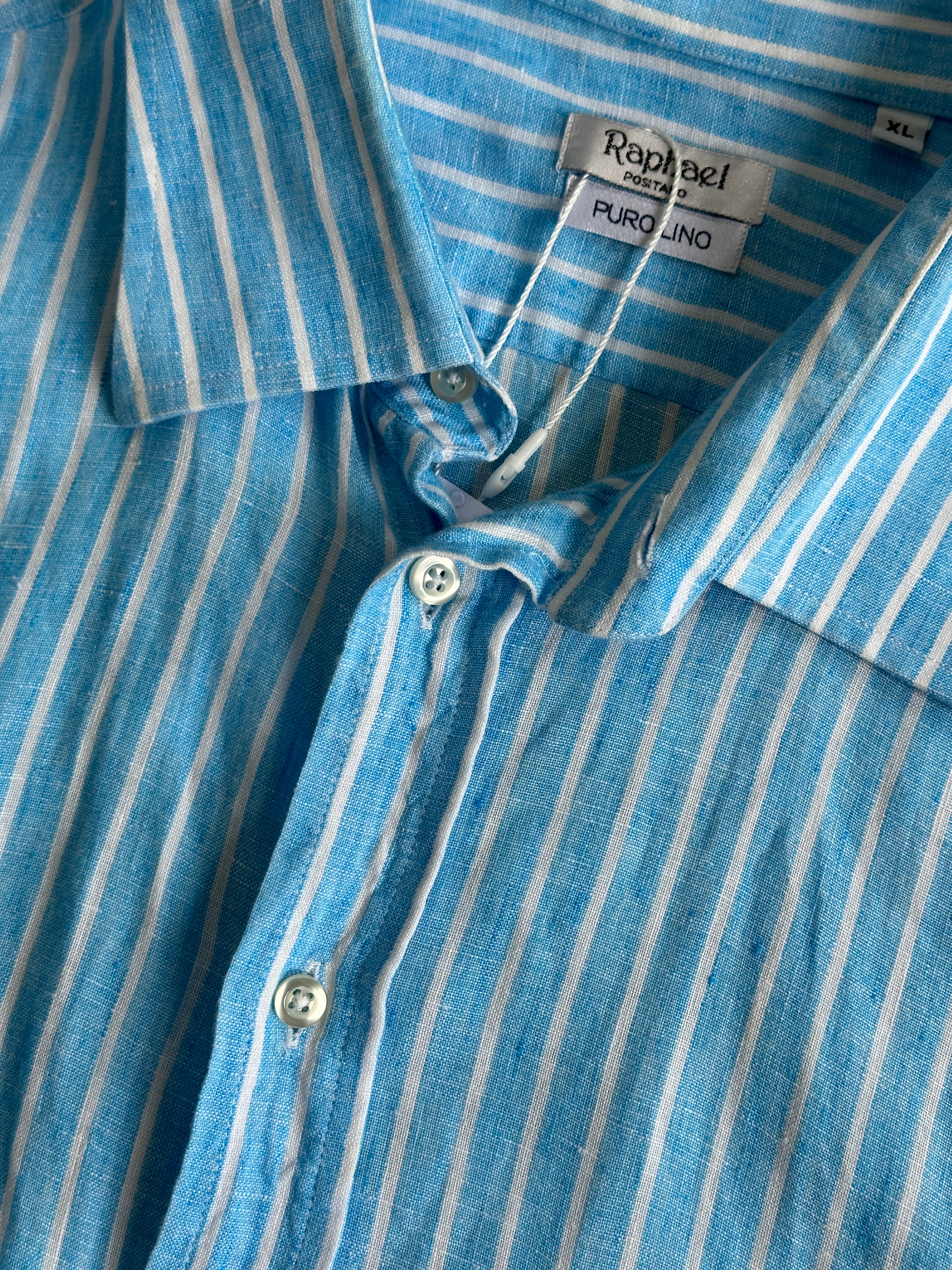 Vintage Italian vintage pure linen stripe shirt in size XL displayed flat, showcasing its classic design and lightweight fabric.