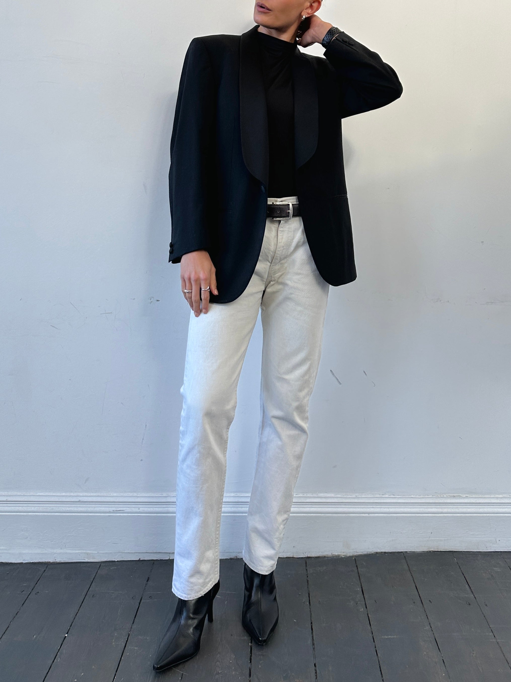 Cerruti pure wool single-breasted tuxedo blazer, tailored fit, dark color, showing lapel and button details.