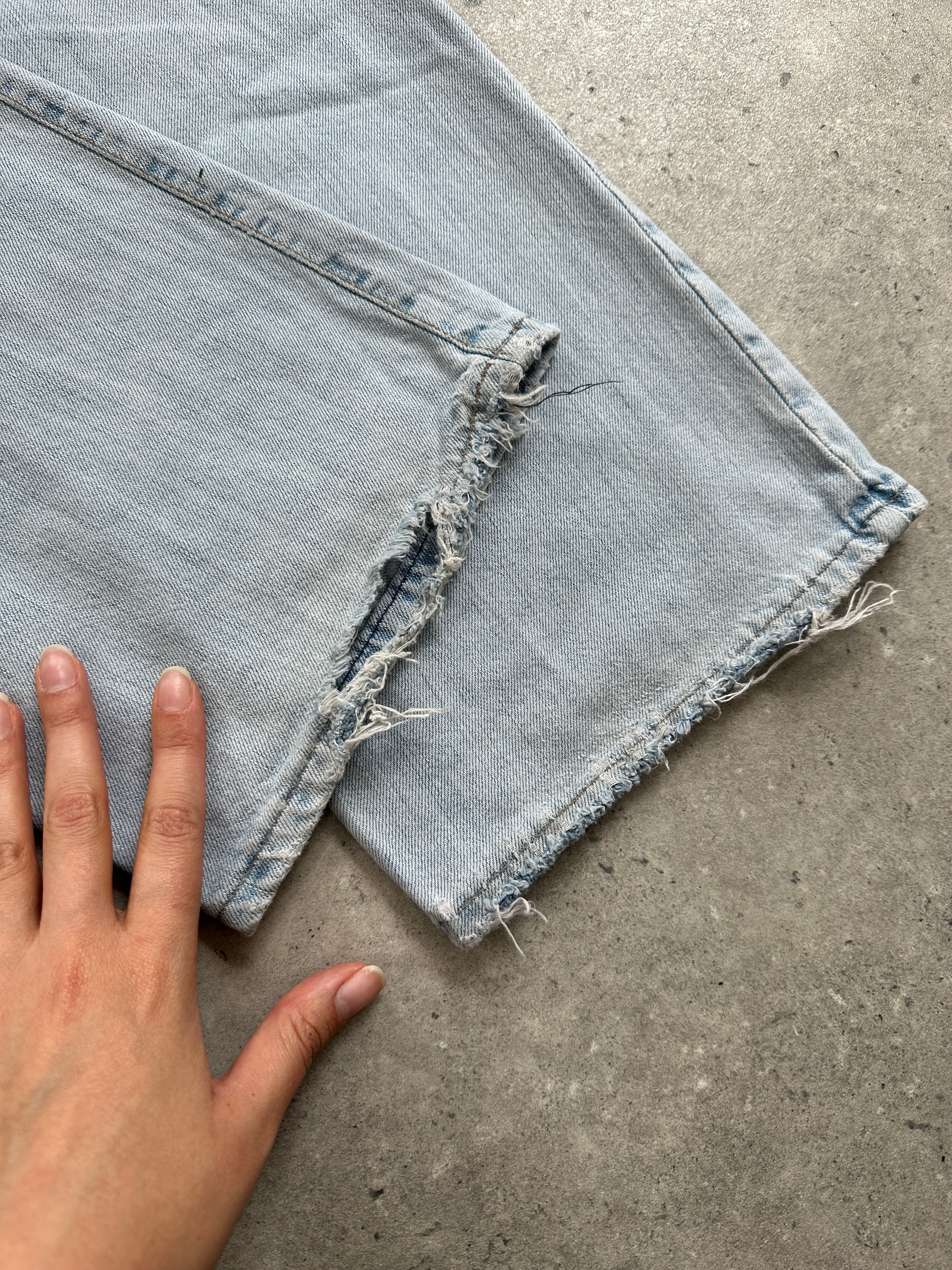 Armani Jeans light wash mid-rise denim jeans with W30 waist, classic five-pocket design and slim fit style.