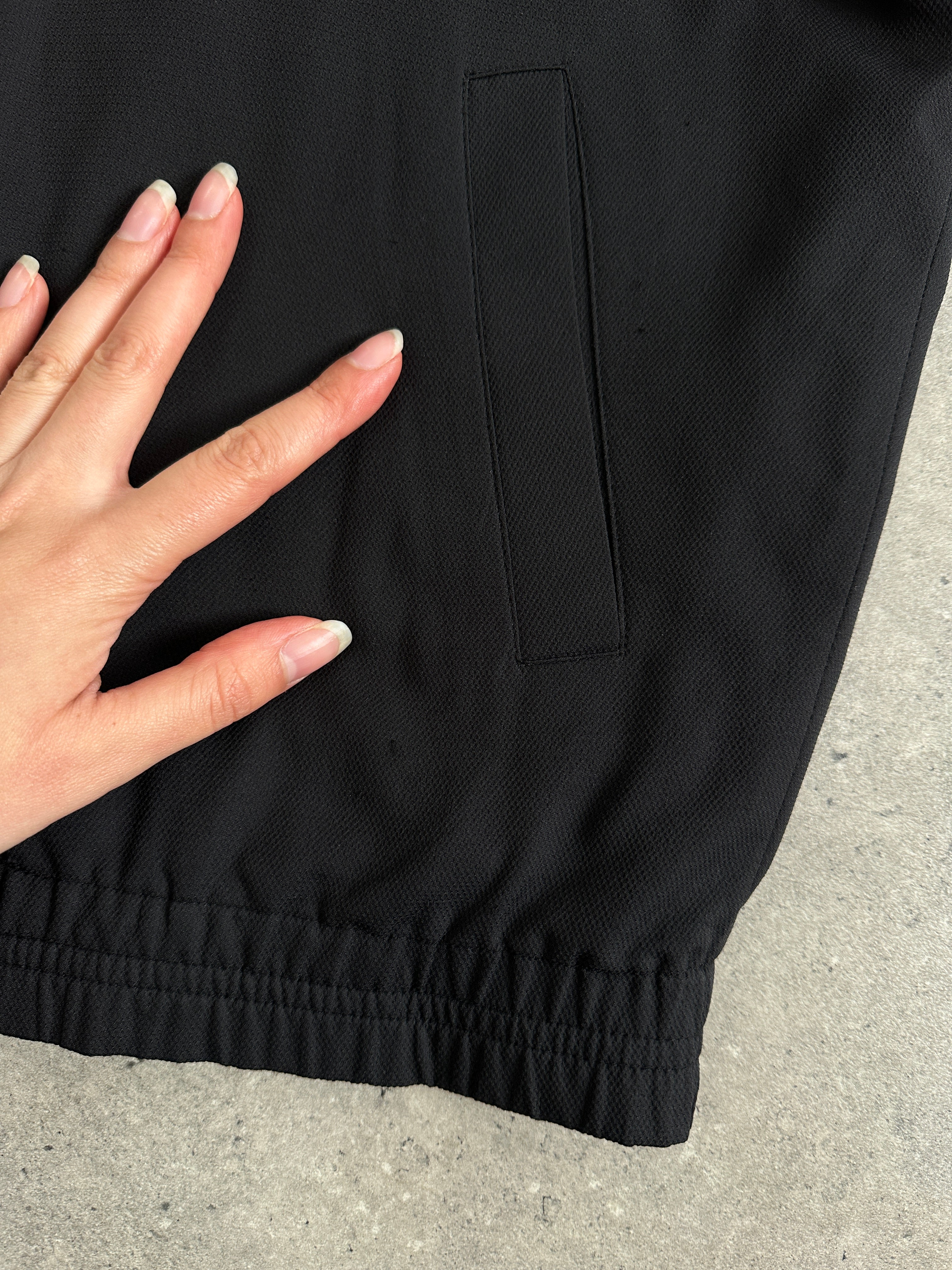 Yves Saint Laurent Pour Homme logo bomber jacket in size M, featuring a sleek design with embroidered branding and classic bomber style